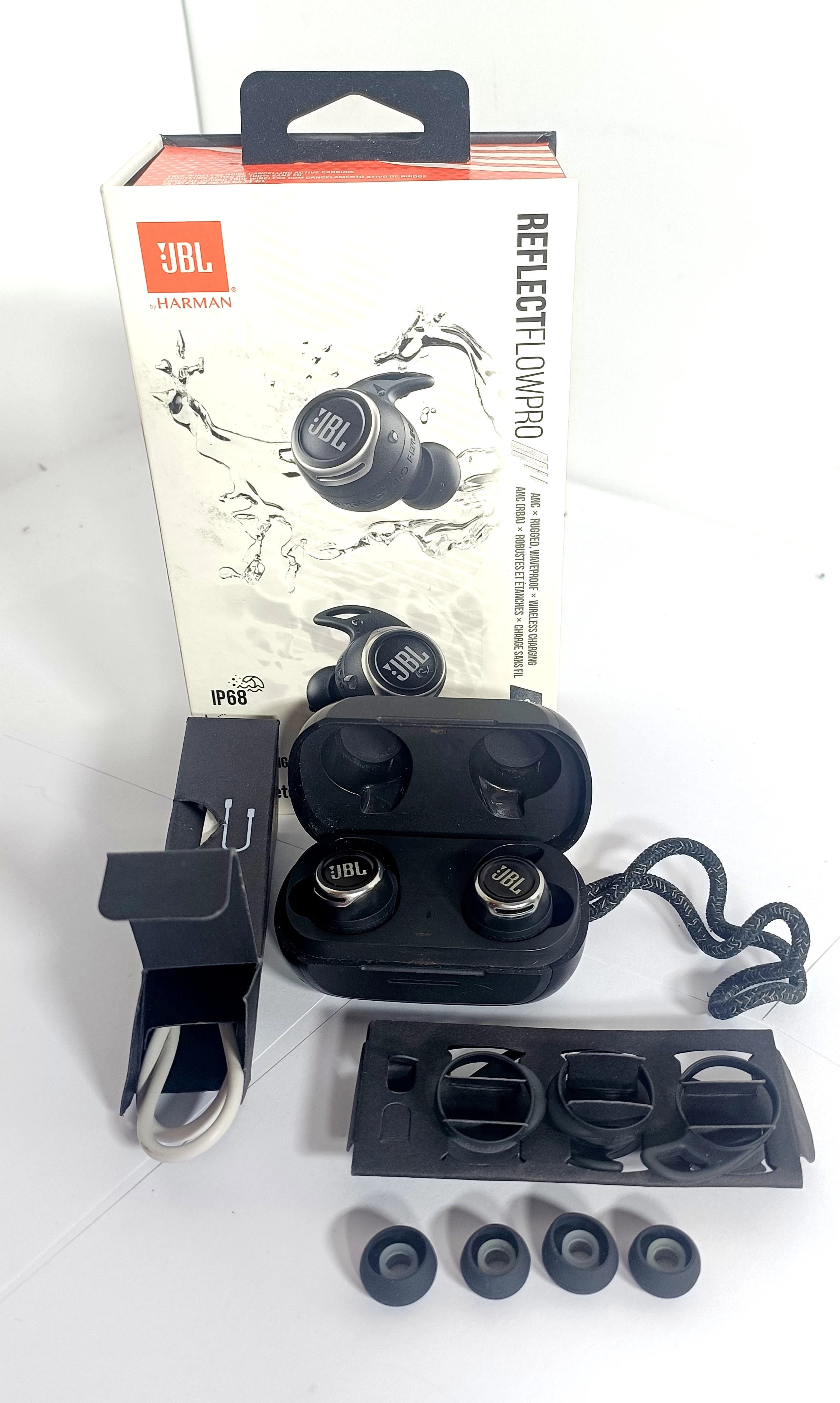 sluchawki-bt-jbl-reflect-flo-pro-ip68-komplet-stan-uzywany