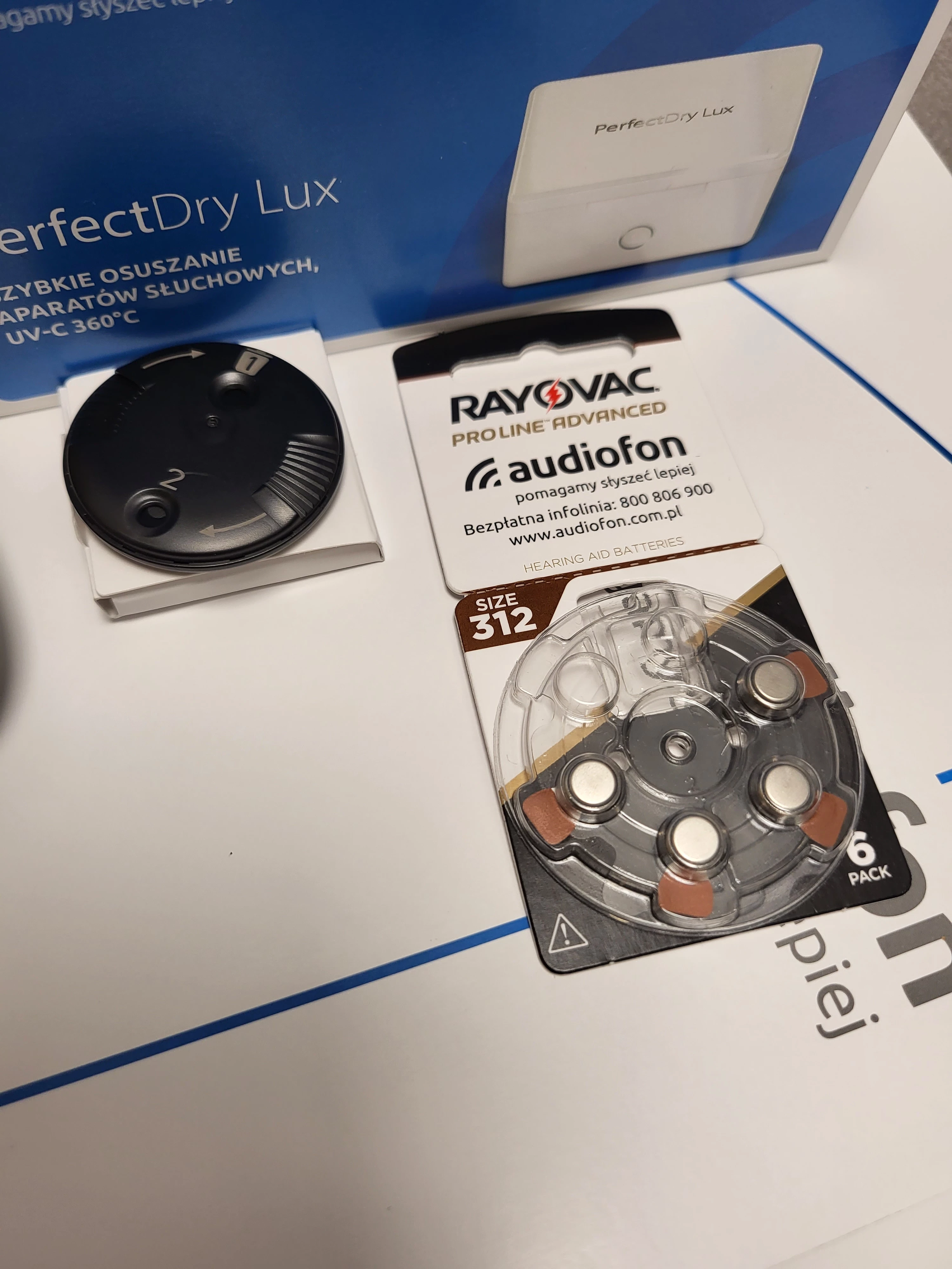 aparat-sluchowy-sonova-blu-moxi-b1-312-sand-czyscik-audiofon-marka-unitron