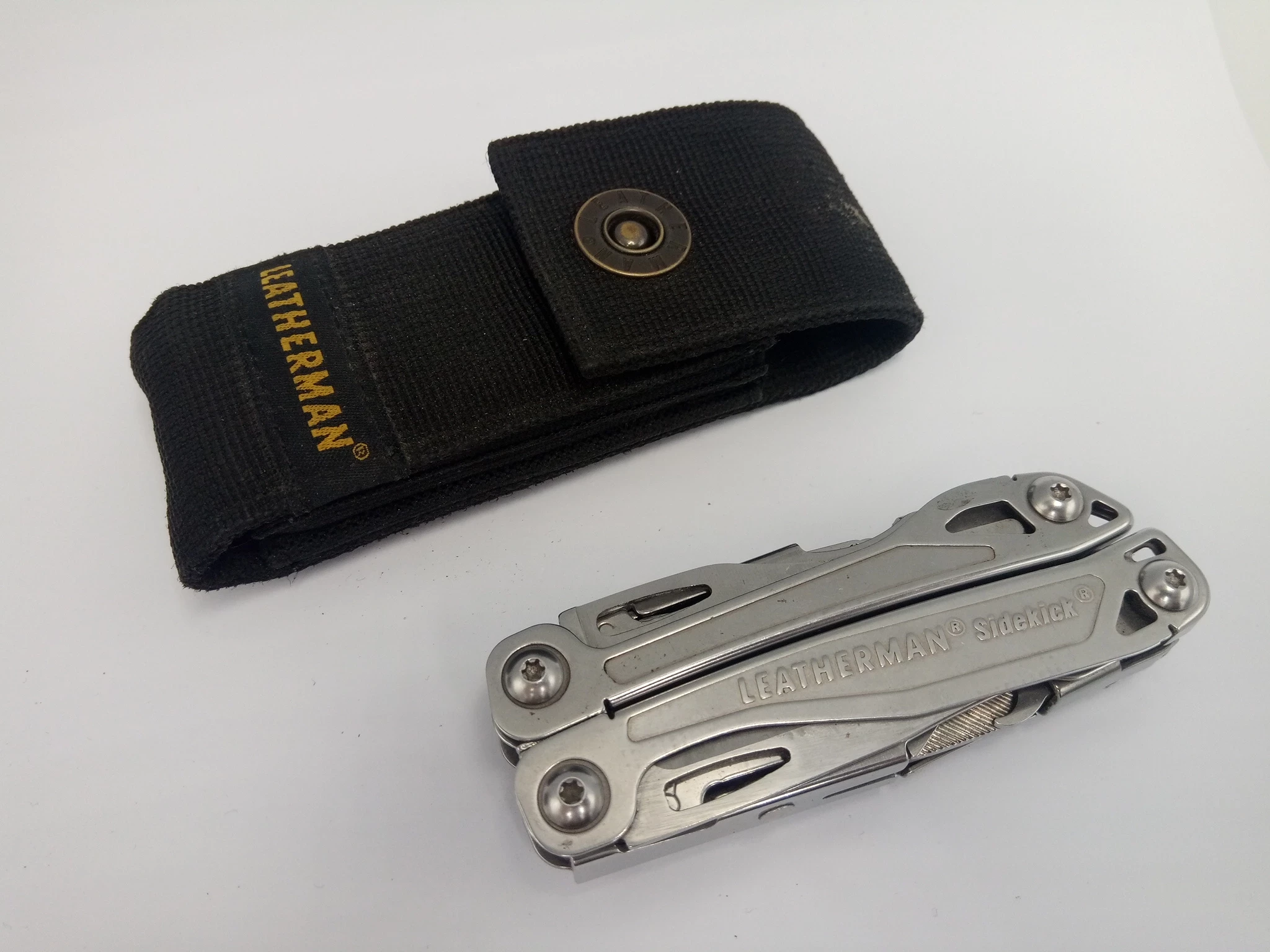 multitool-leatherman-sidekick-z-kabura-opis-grawer-stan-uzywany