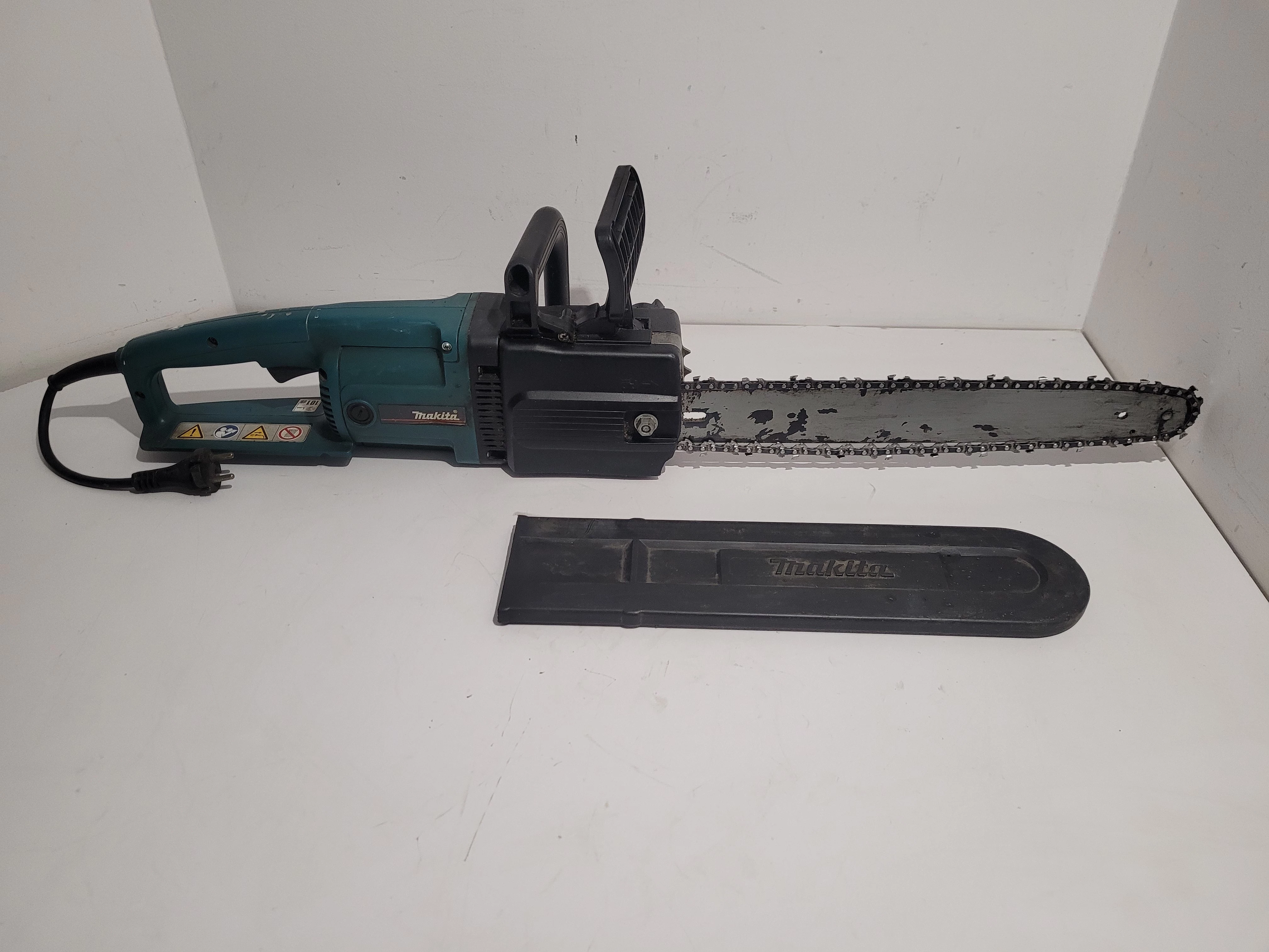 pila-elektryczna-lancuchowa-makita-model-uc4003a-stan-uzywany