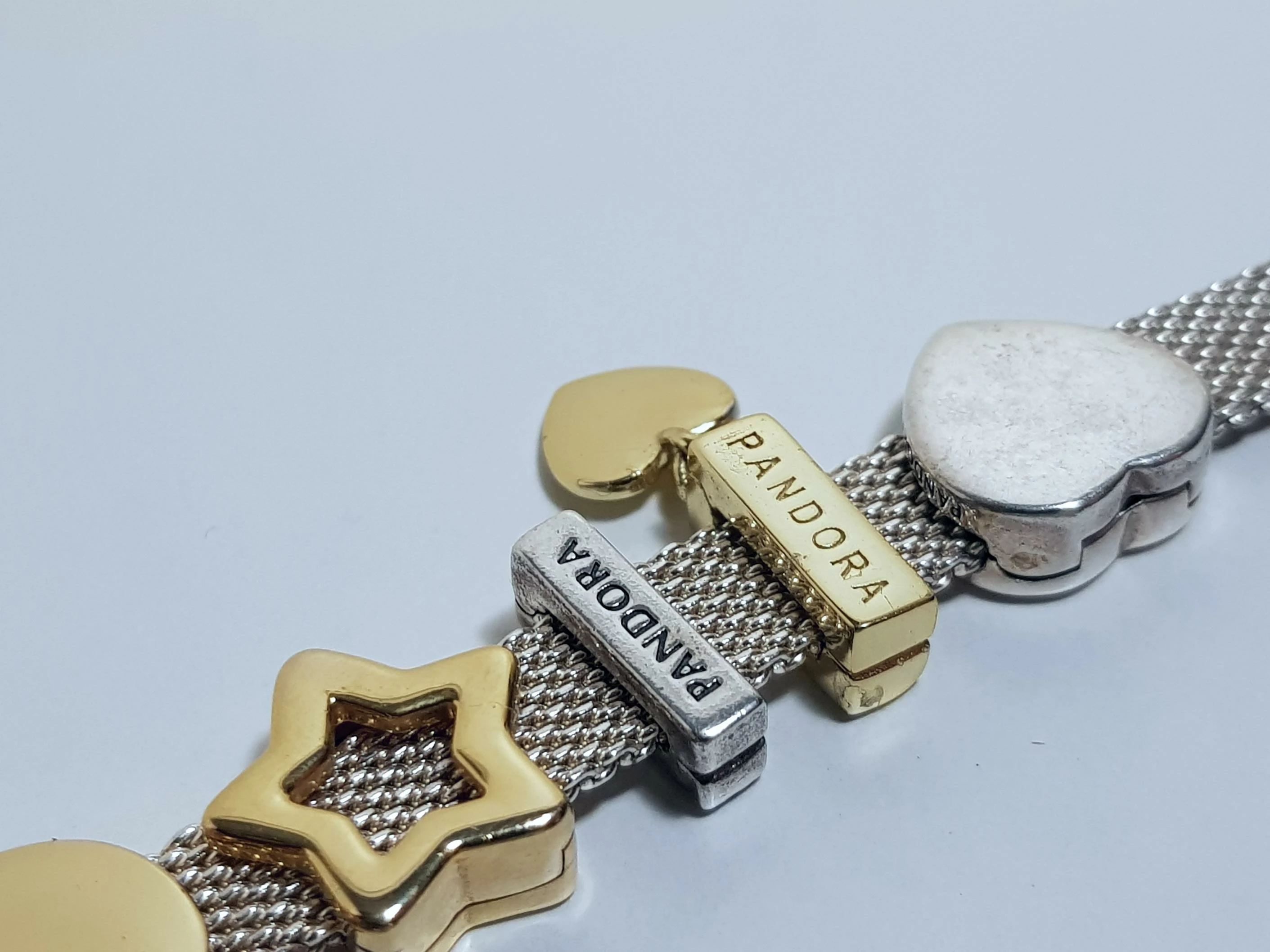 bransoletka-pandora-charmsy-reflexions-material-srebro