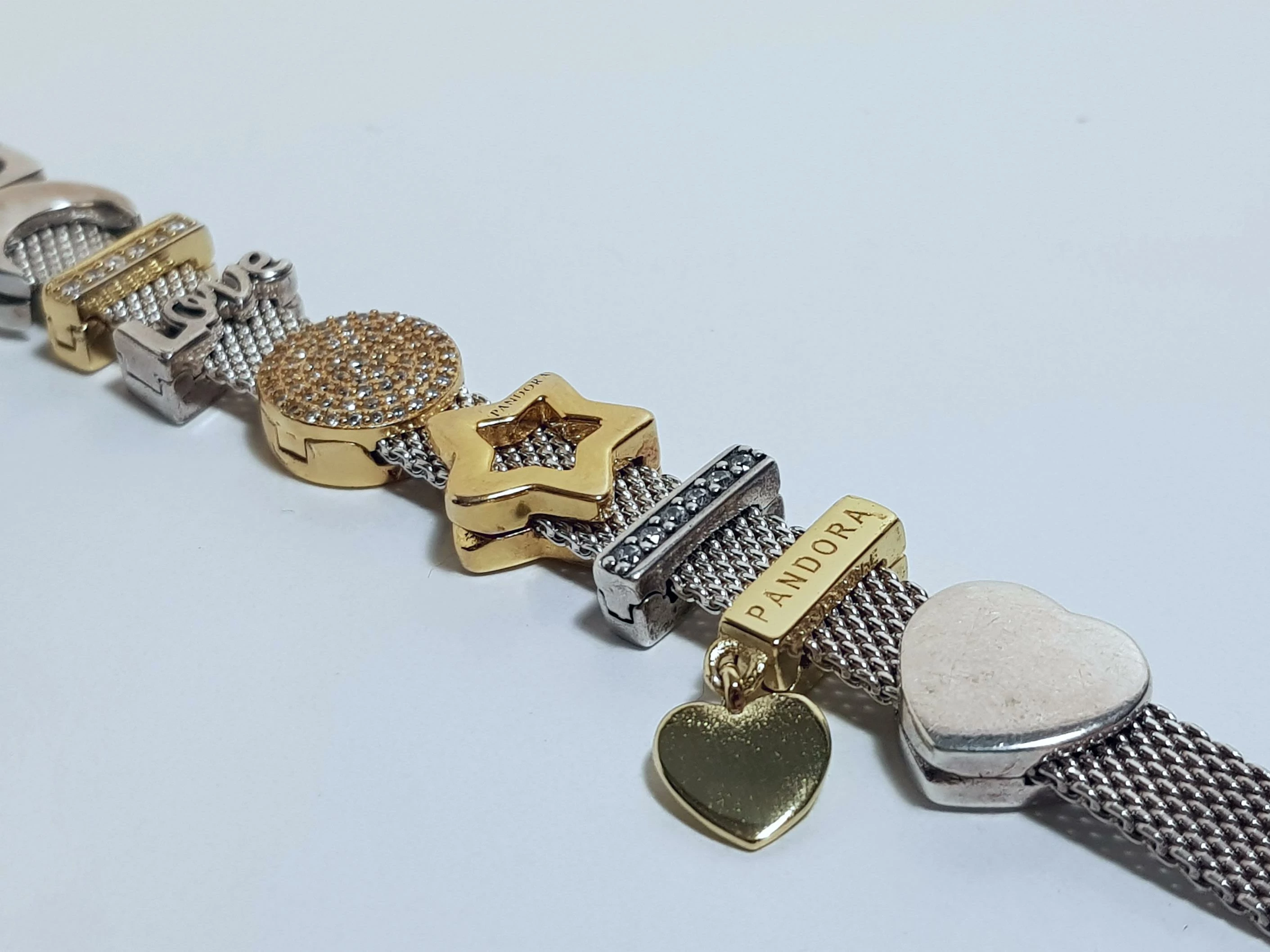 bransoletka-pandora-charmsy-reflexions-stan-uzywany