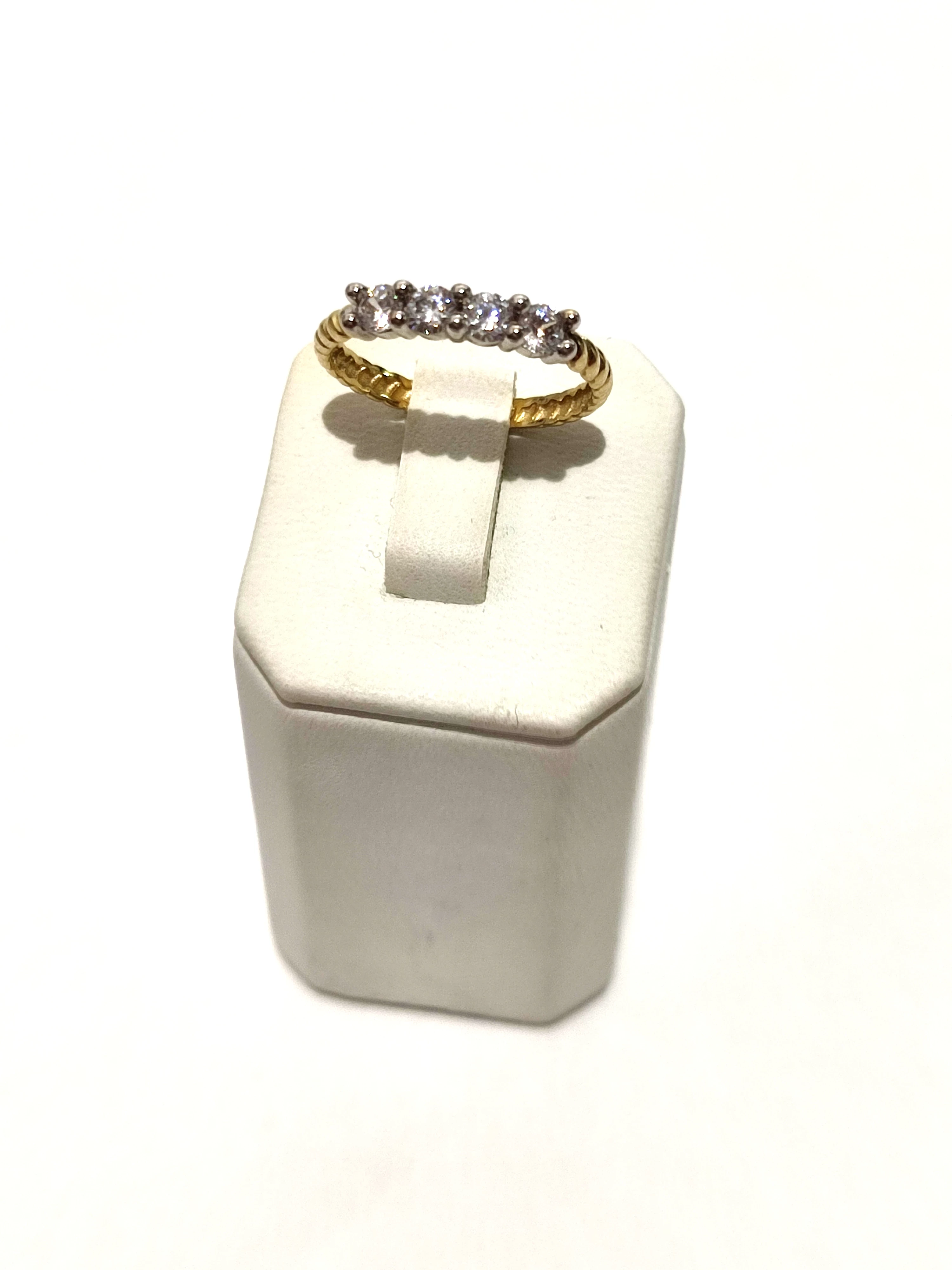 piekny-pleciony-pierscionek-z-czterema-cyrkoniami-p585-w152-r11-ean-gtin-5905868206128