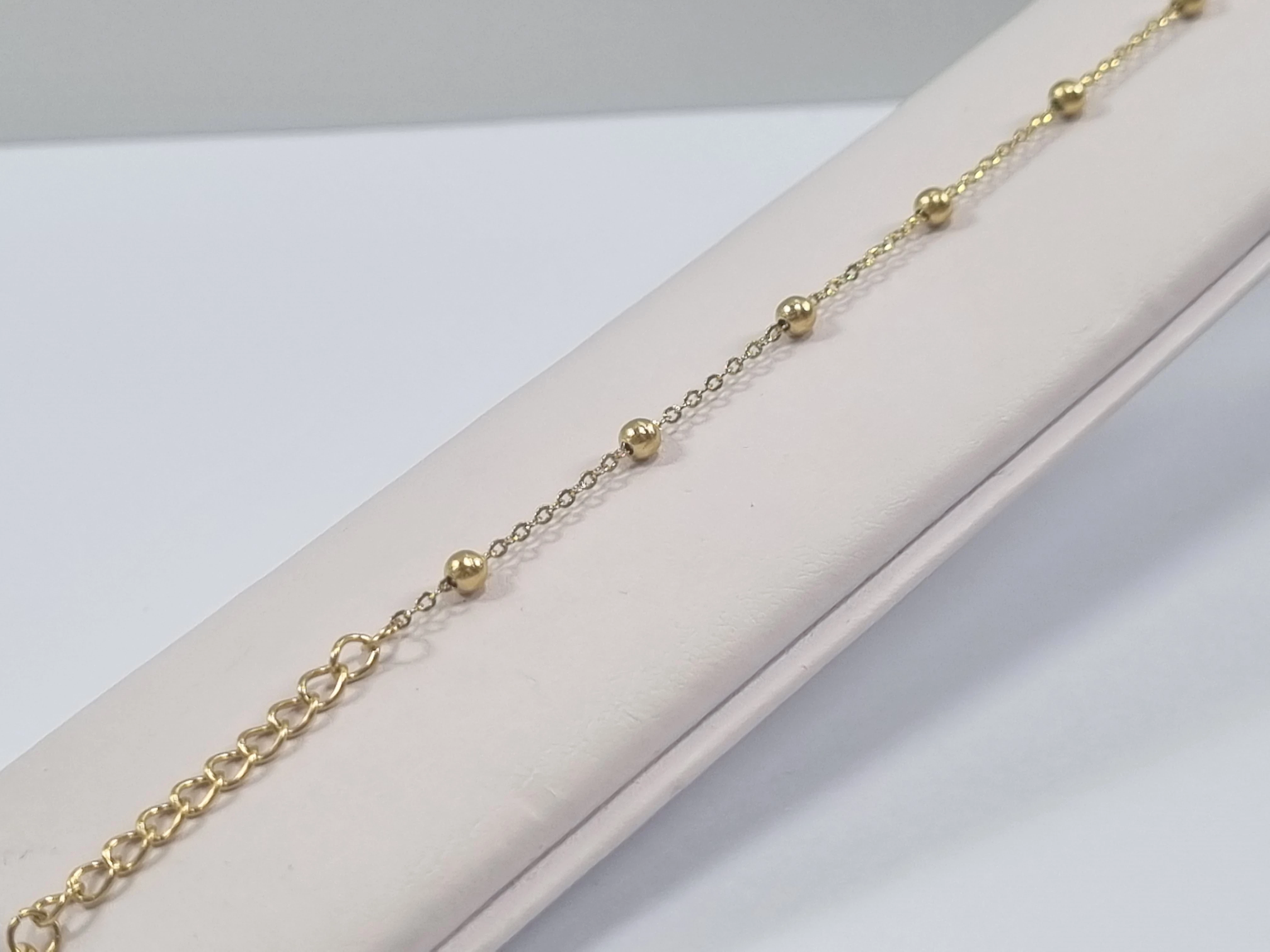 bransoletka-stal-pozlacana-9-kulek-stan-11323-2