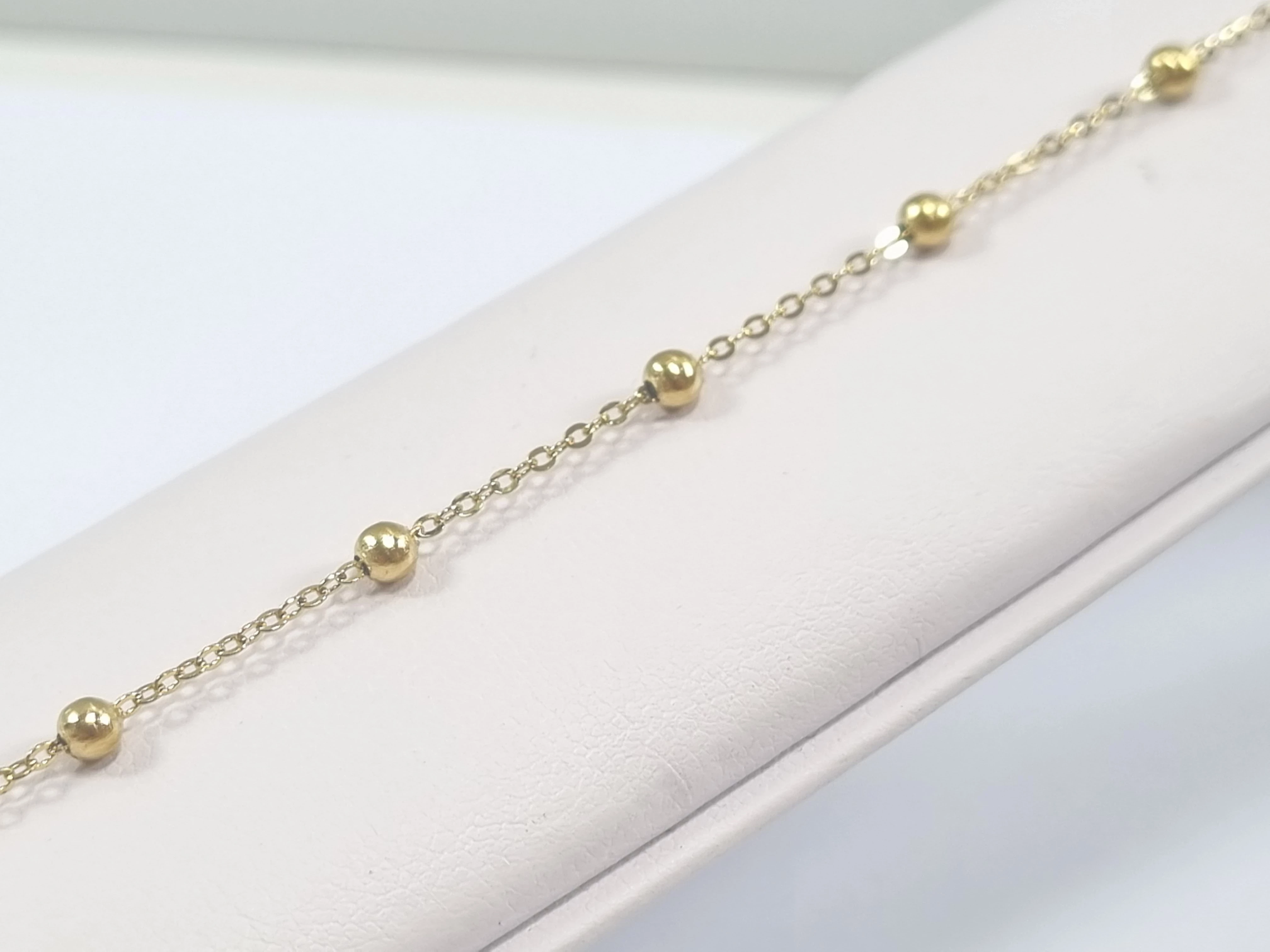 bransoletka-stal-pozlacana-9-kulek-3-maja-48-poznan-ska-x