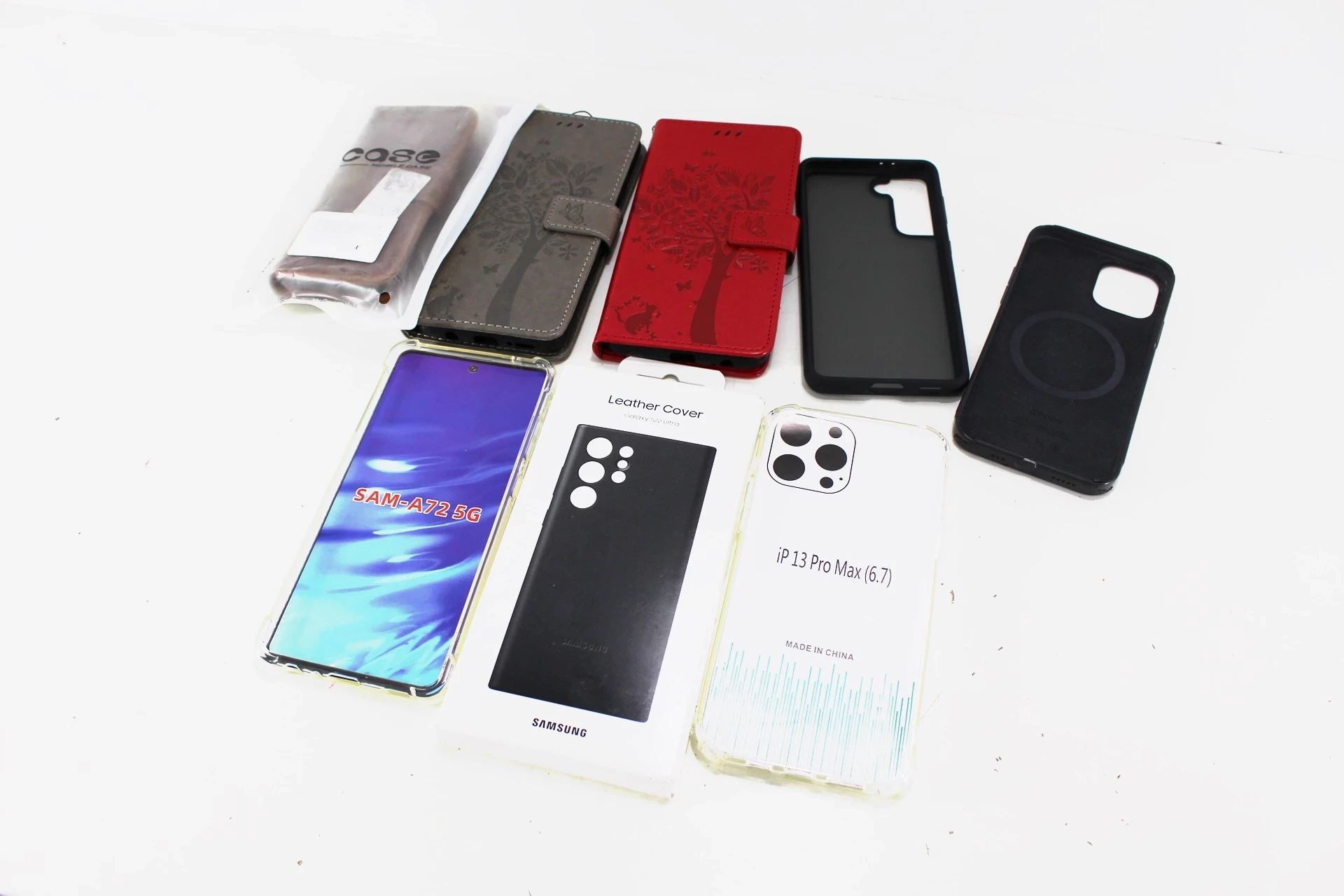 wielki-zestaw-etui-pokrowcow-na-telefony-stan-powystawowy