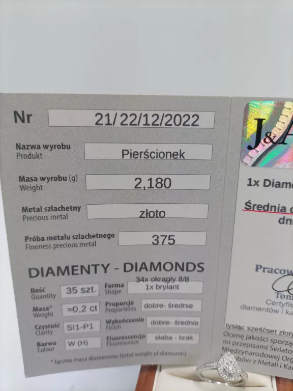 PIERSCIONEK Z BIAŁEGO ZŁOTA Z BRYLANTAMI PR.375 R.7