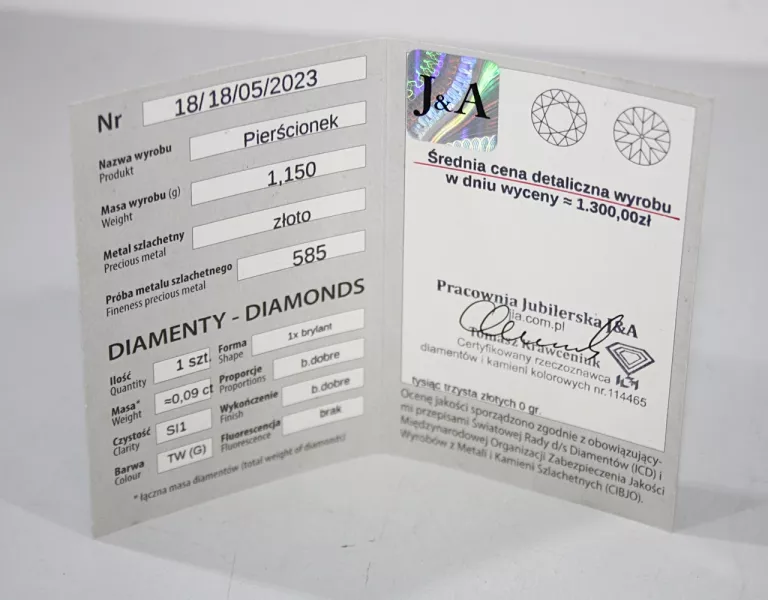 delikatny-zloty-pierscionek-z-brylantem-stan-uzywany