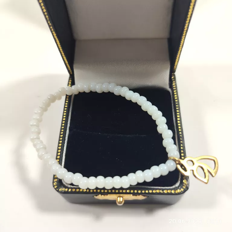 sliczna-delikatna-bransoletka-lilou-z-aniolkiem-material-inny