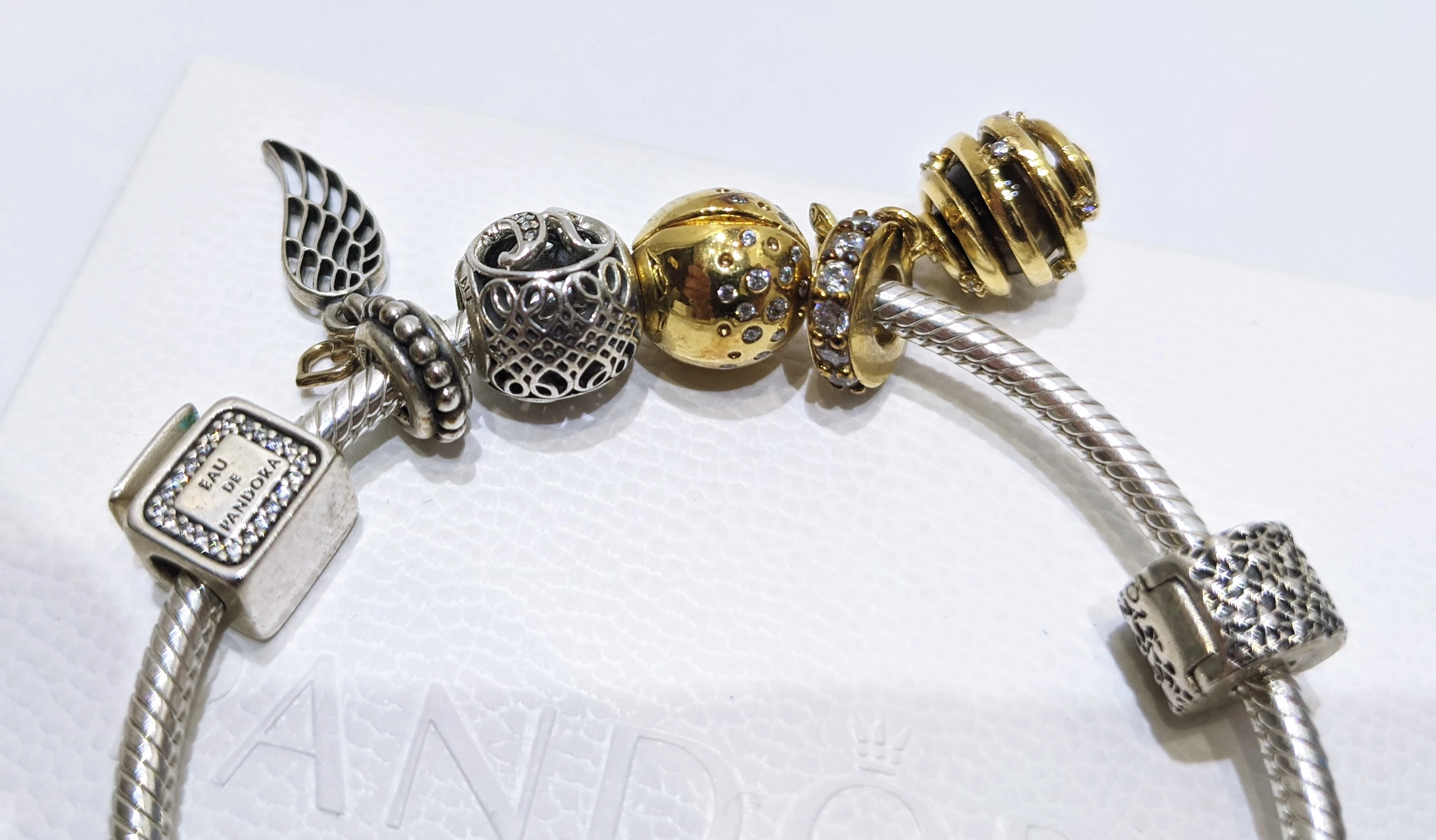 bransoletka-pandora-bangle-rose-gold-7-charms-17cm-kamien-bez-kamienia