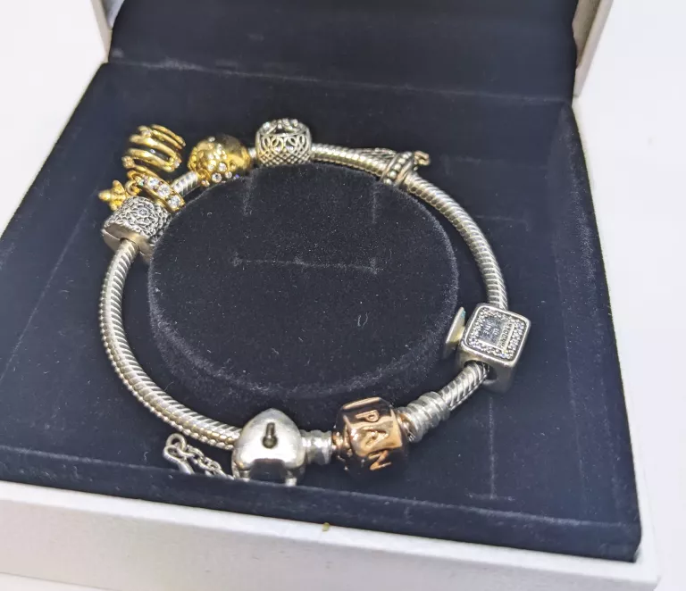 bransoletka-pandora-bangle-rose-gold-7-charms-17cm-stan-uzywany