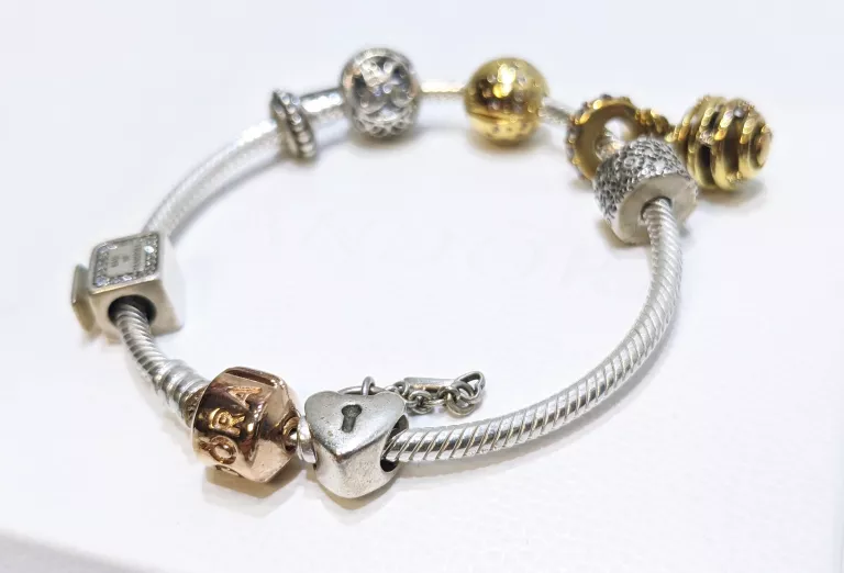 bransoletka-pandora-bangle-rose-gold-7-charms-17cm-rodzaj-wyrob-jubilerski