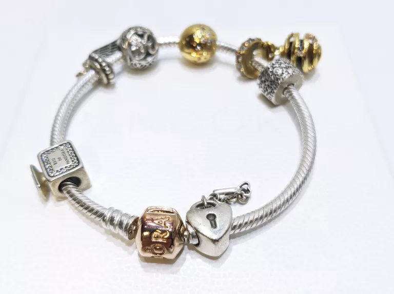 bransoletka-pandora-bangle-rose-gold-7-charms-17cm-material-srebro