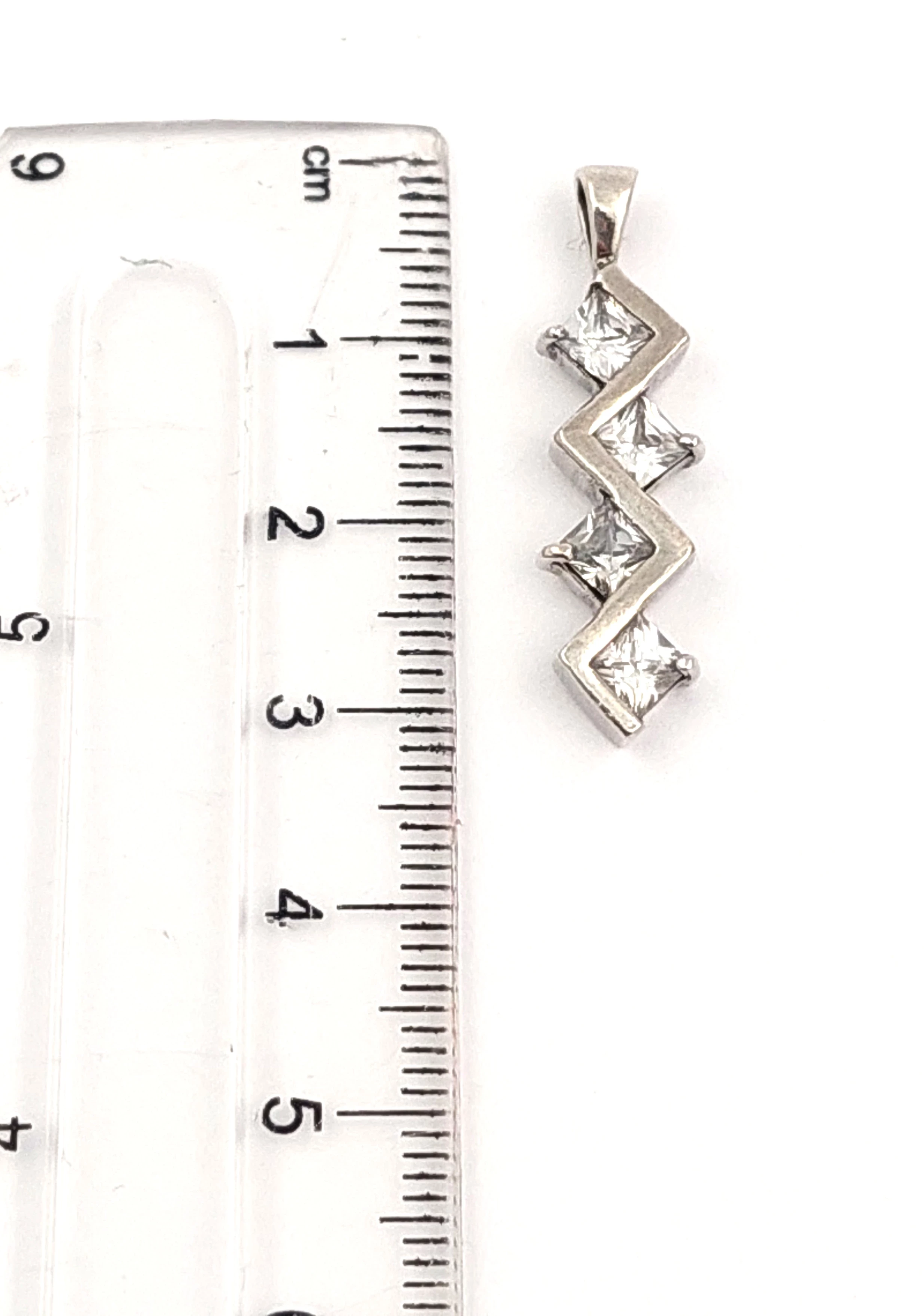 srebrna-zawieszka-4-cyrkonie-278g-stan-11323-2