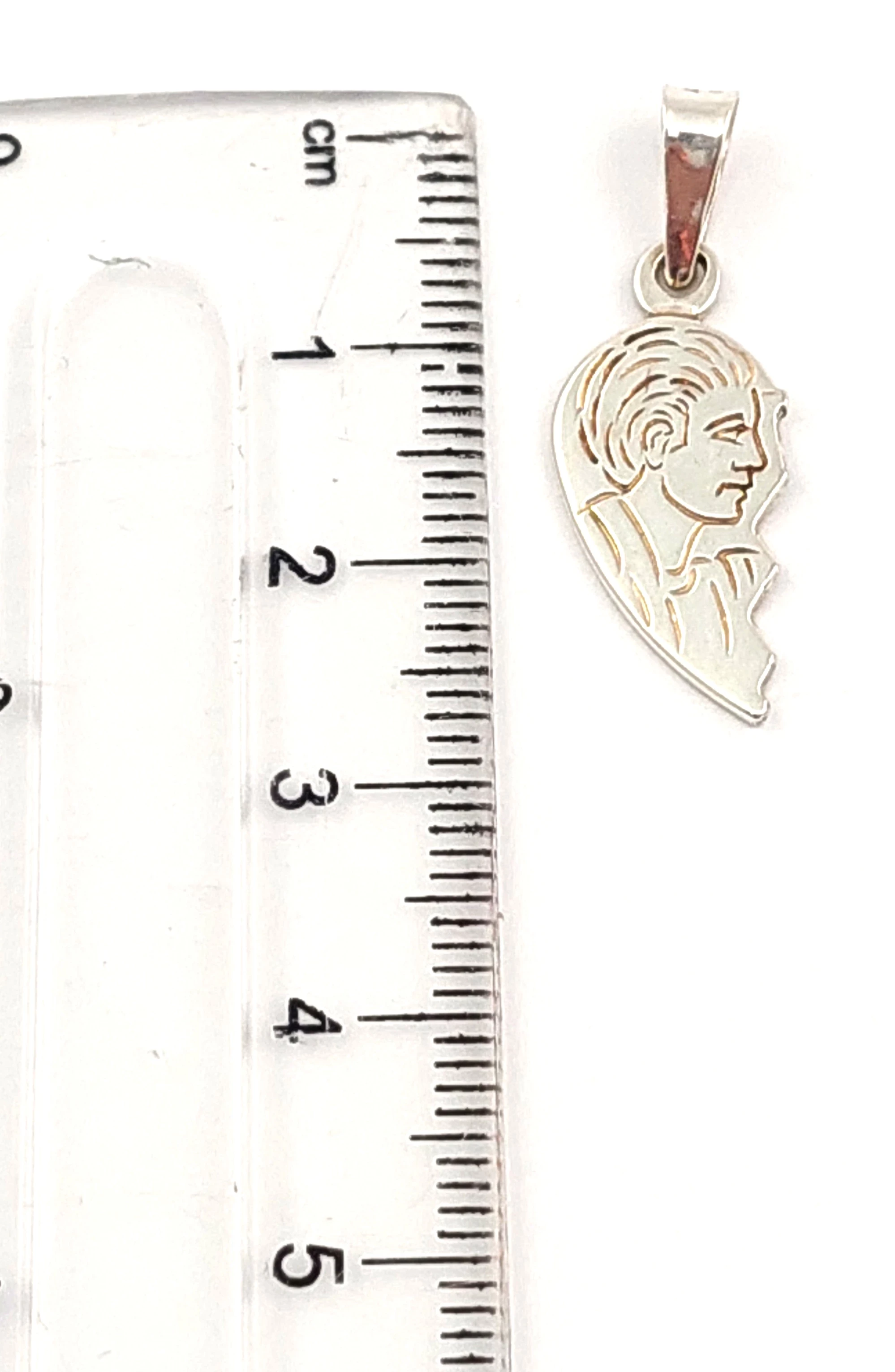 srebrna-zawieszka-pol-serca-168g-stan-11323-2