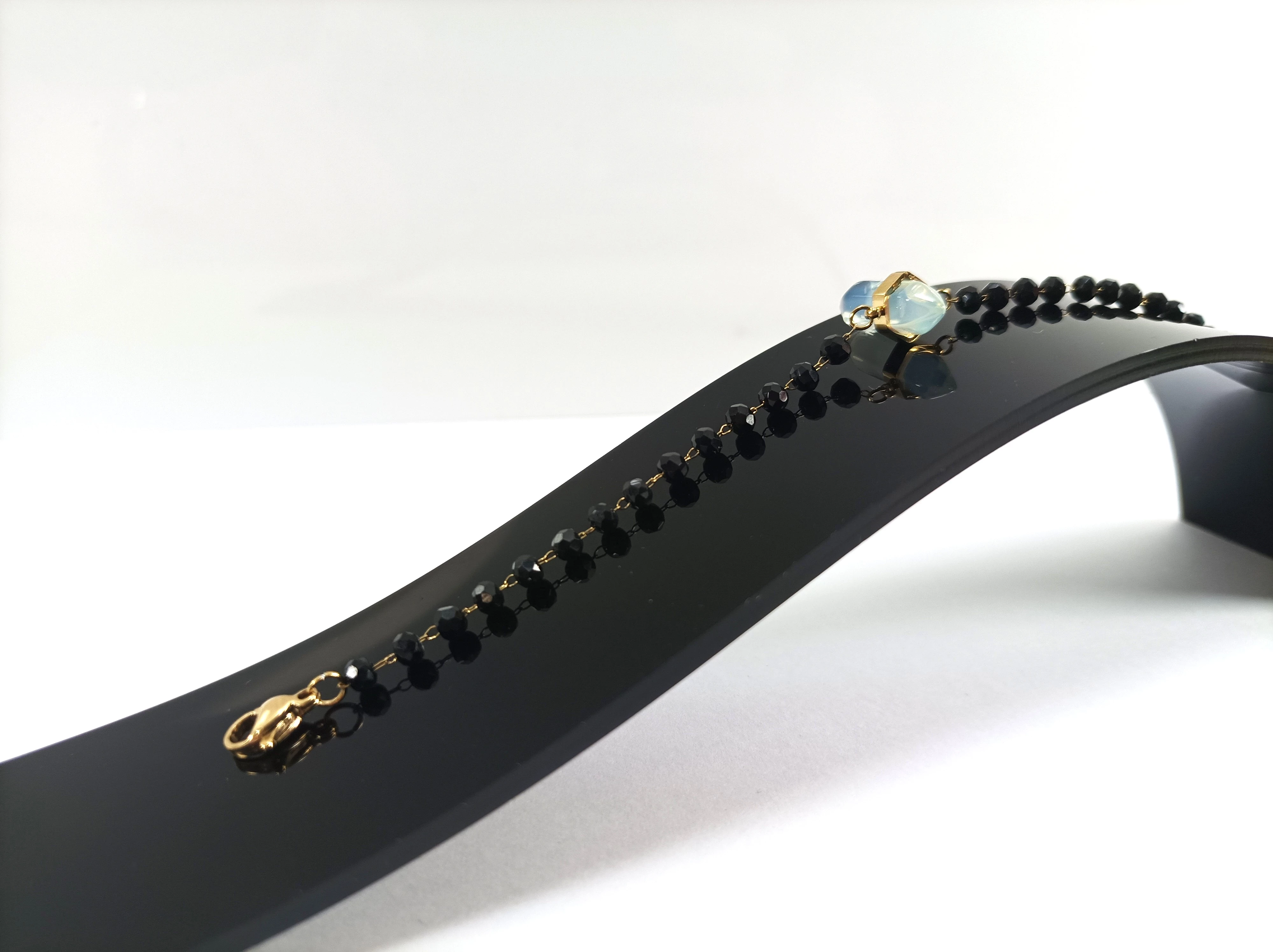 bransoletka-stal-pozlacana-czarne-koraliki-gorna-wilda-100-poznan-ska-x