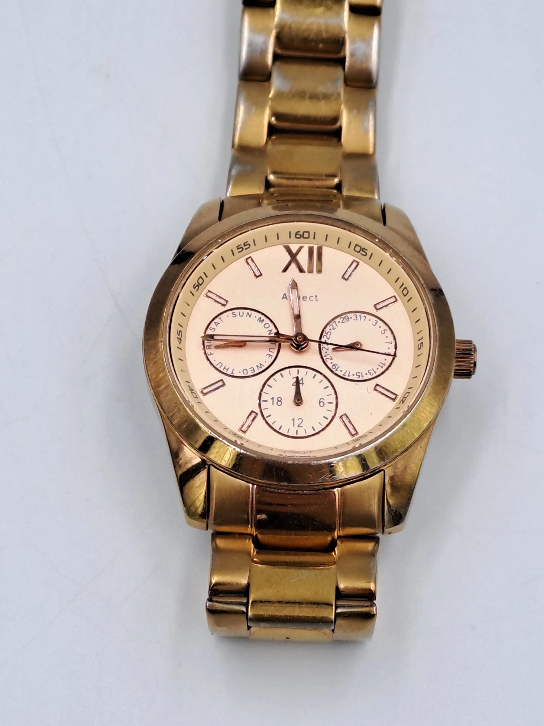 zegarek-aspect-zloty-okazja-ksztalt-koperty-okragla