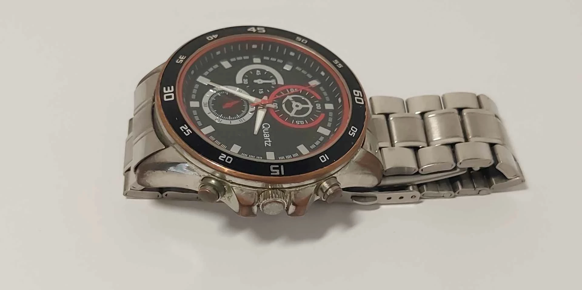 zegarek-meski-ksztalt-koperty-okragla