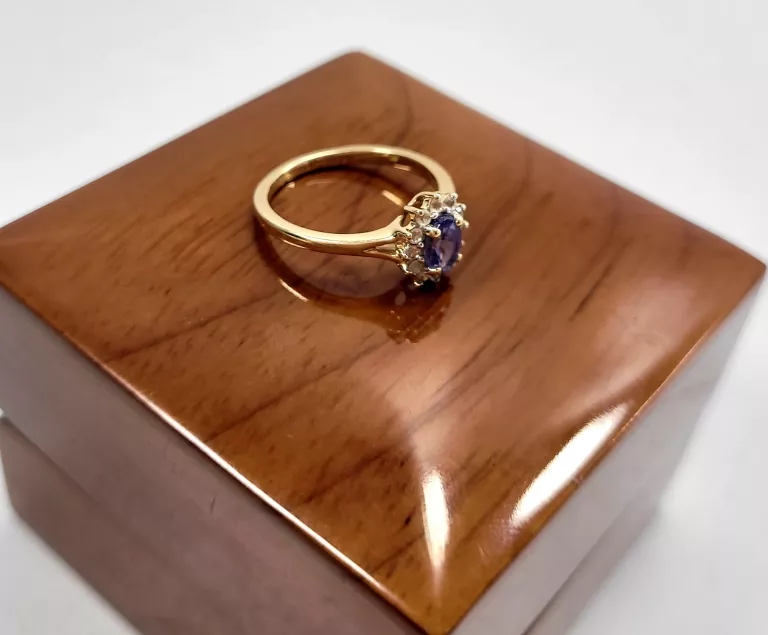 zloty-pierscionek-tanzanittopazy-wkruk-p585-25-rodzaj-wyrob-jubilerski