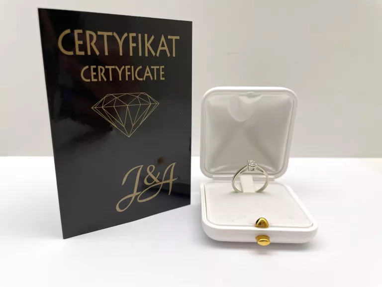 BIAŁE ZŁOTO PIERŚCIOENK Z BRYLANTEM 750 R.14 2,10G