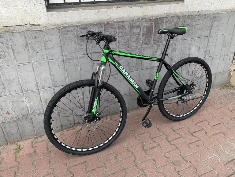 ROWER CARAIMAN 29 CALI STALOWY ZIELONY