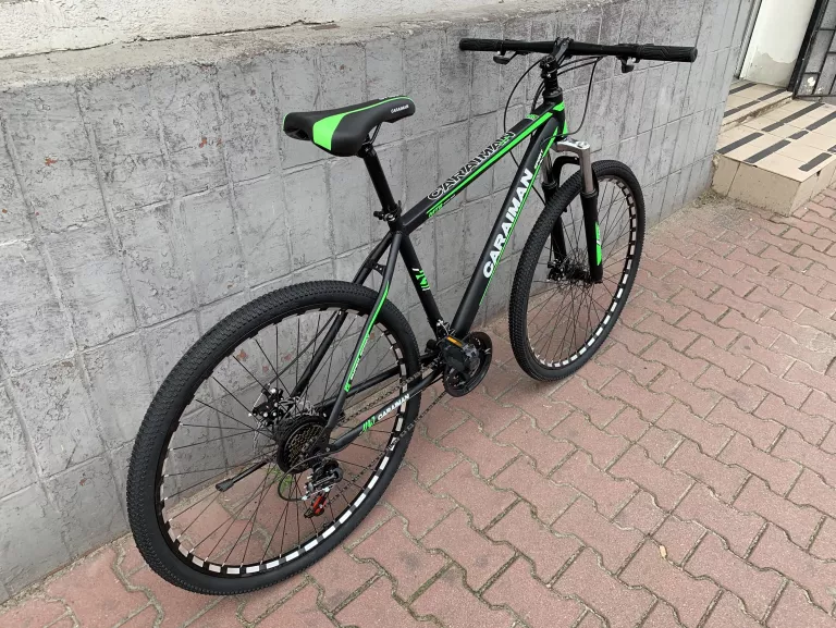 ROWER CARAIMAN 29 CALI STALOWY ZIELONY