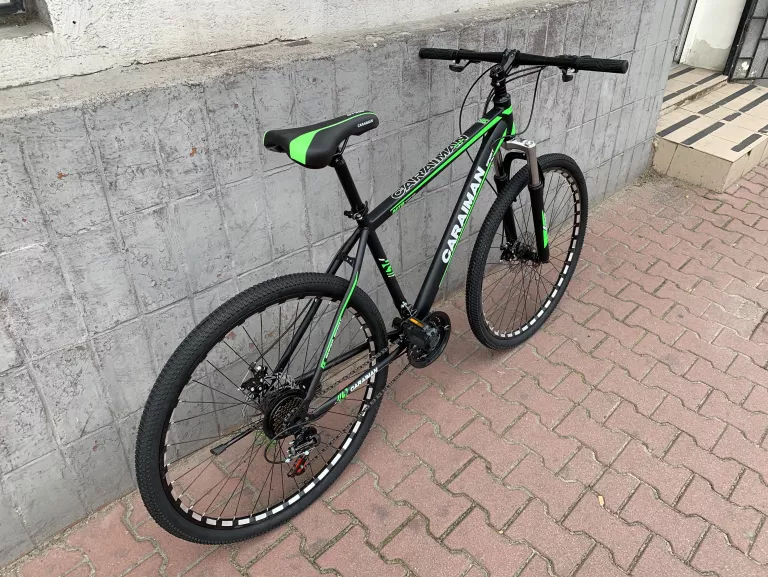 ROWER CARAIMAN 29 CALI STALOWY ZIELONY
