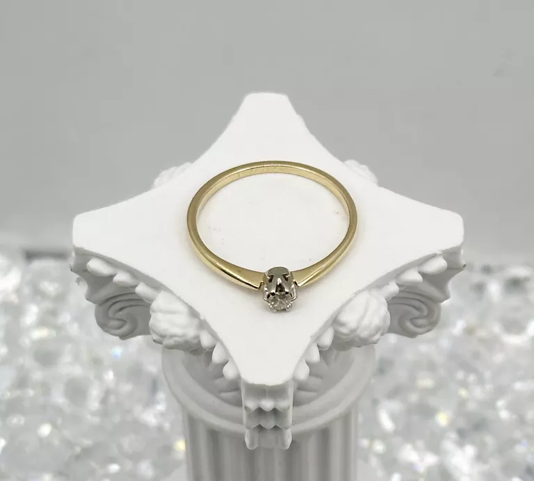 delikatny-pierscionek-z-brylantem-14-karatow-material-15835-2