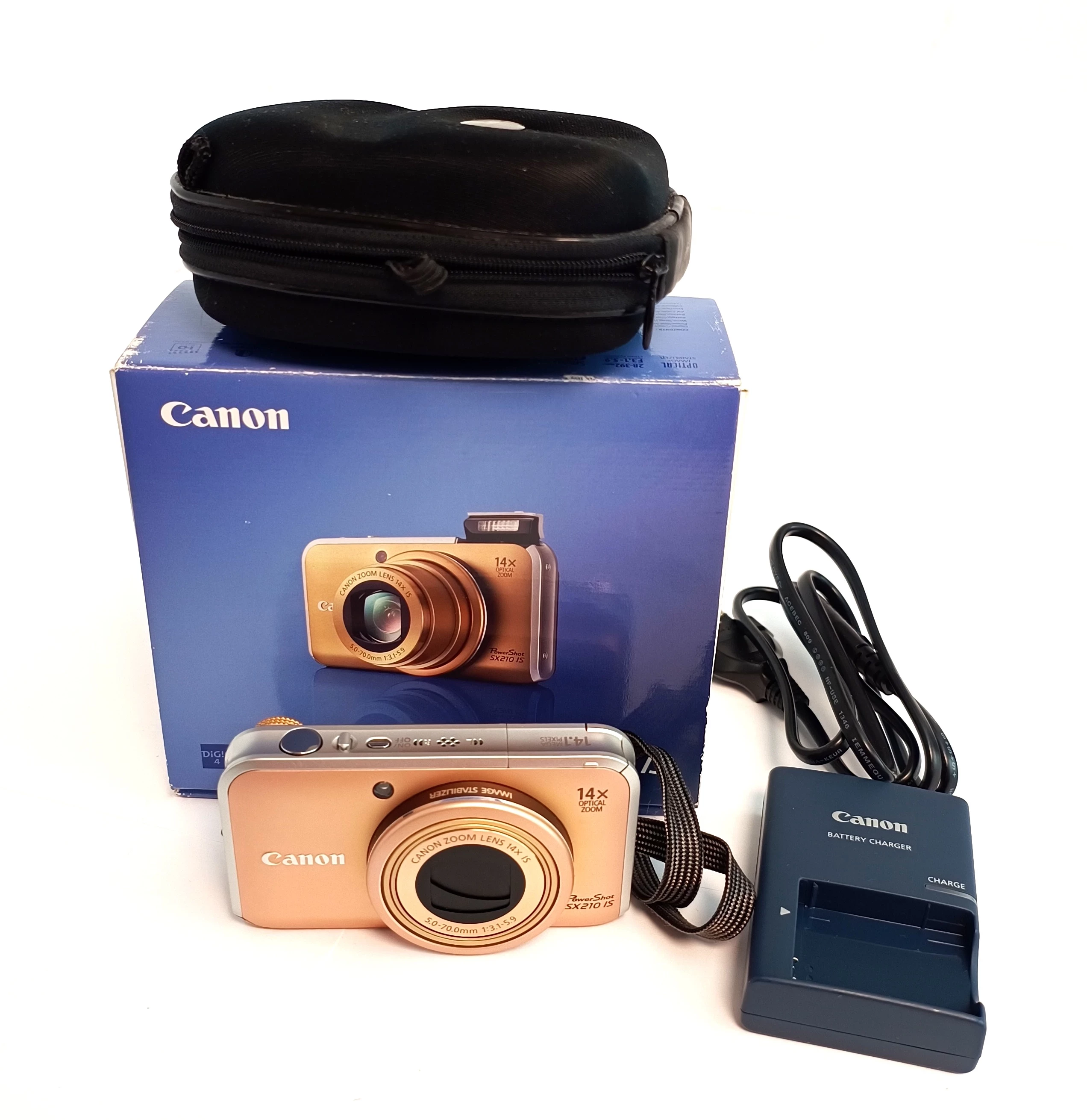 aparat-cyfrowy-canon-powershot-sx210-is-pudelko-aleja-jana-pawla-ii-9b-reda