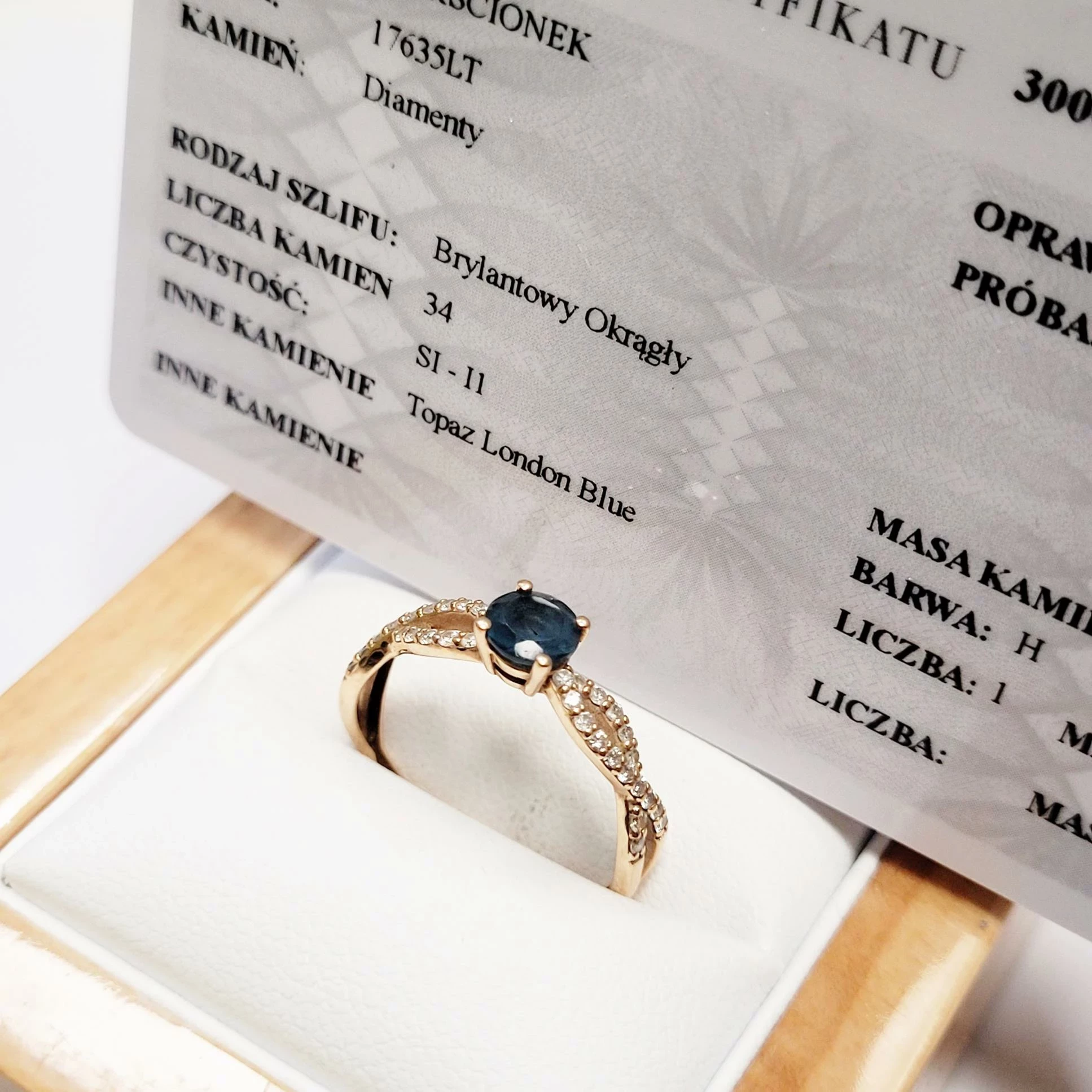 zloty-pierscionek-z-diamentami-i-topazem-yes-certyfikat-aleja-wolnosci-15b-czestochowa-sj