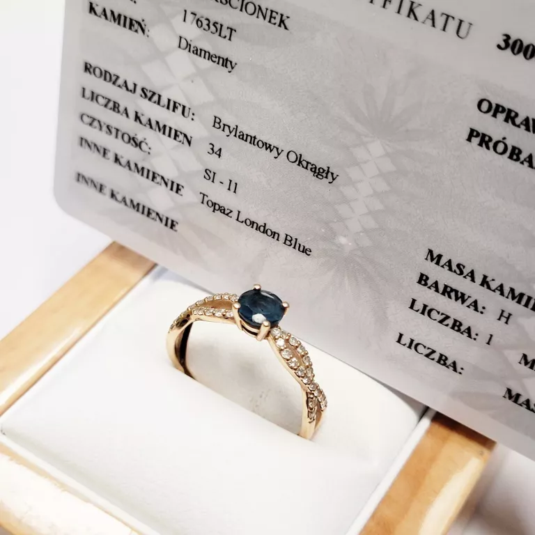 zloty-pierscionek-z-diamentami-i-topazem-yes-certyfikat-aleja-wolnosci-15b-czestochowa-sj