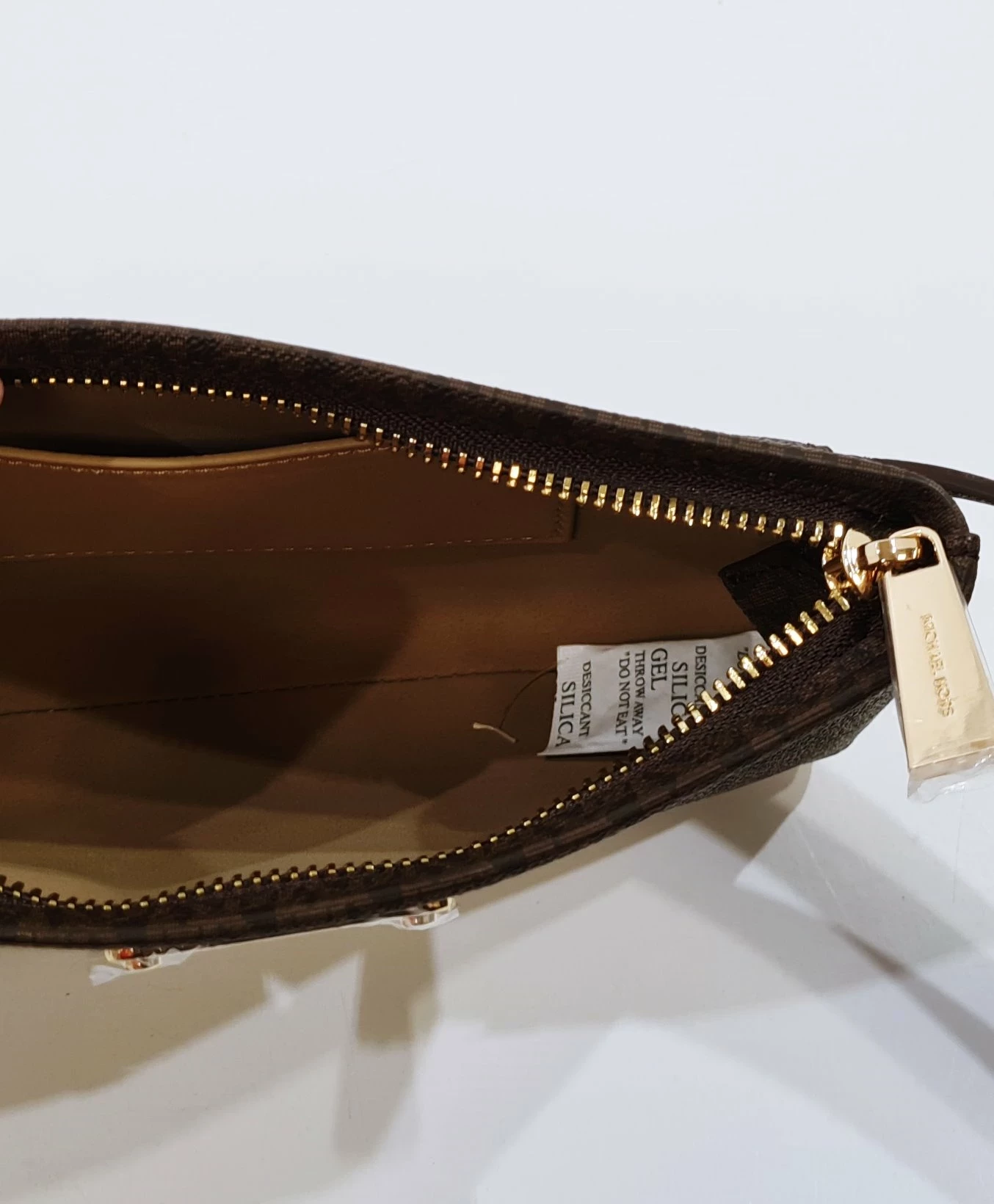 torebka-michael-kors-brazowa-saszetka-nerka-meander-2a-warszawa