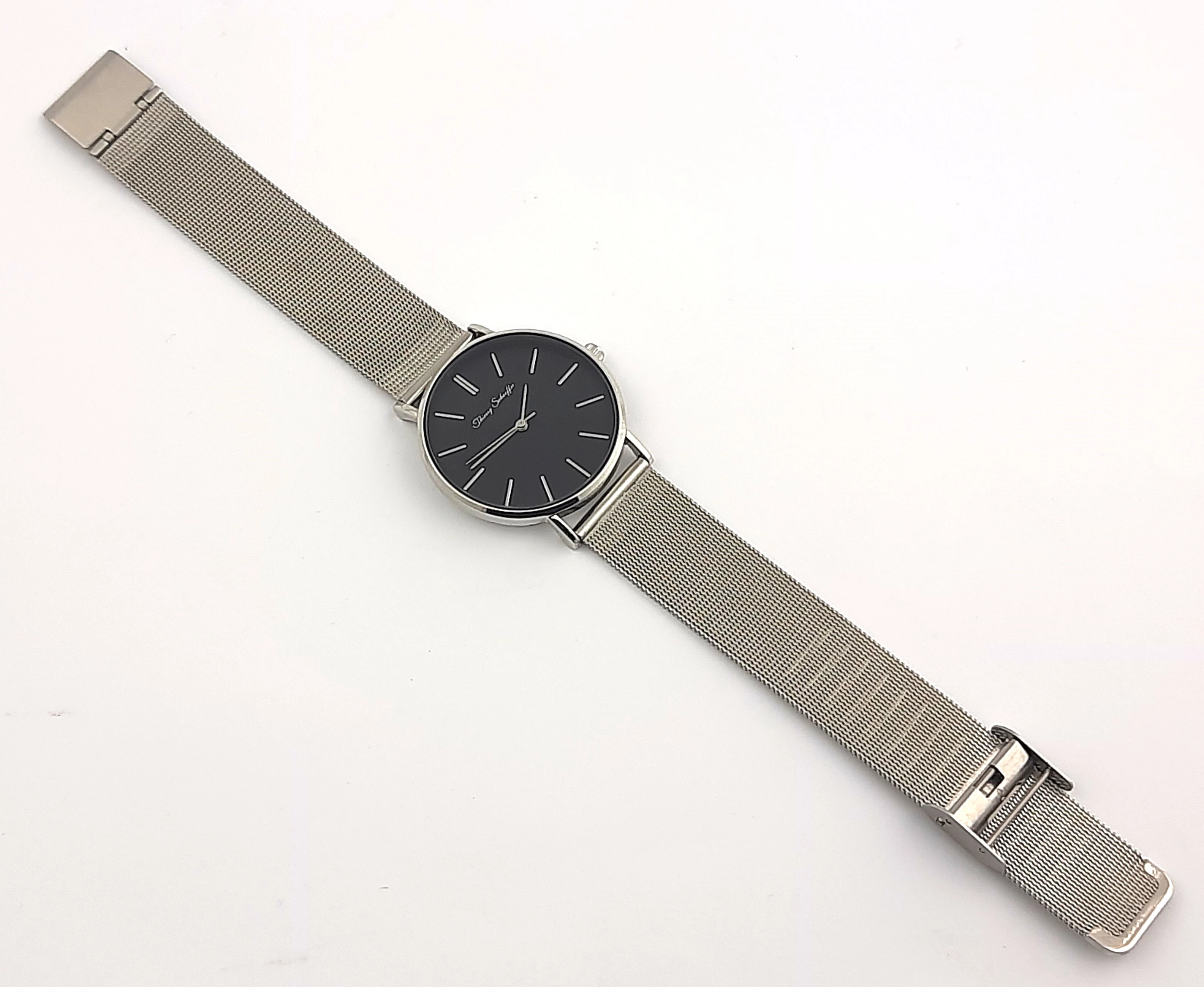 zegarek-damski-thierry-schaeffer-na-srebrnej-bransolecie-stan-uzywany