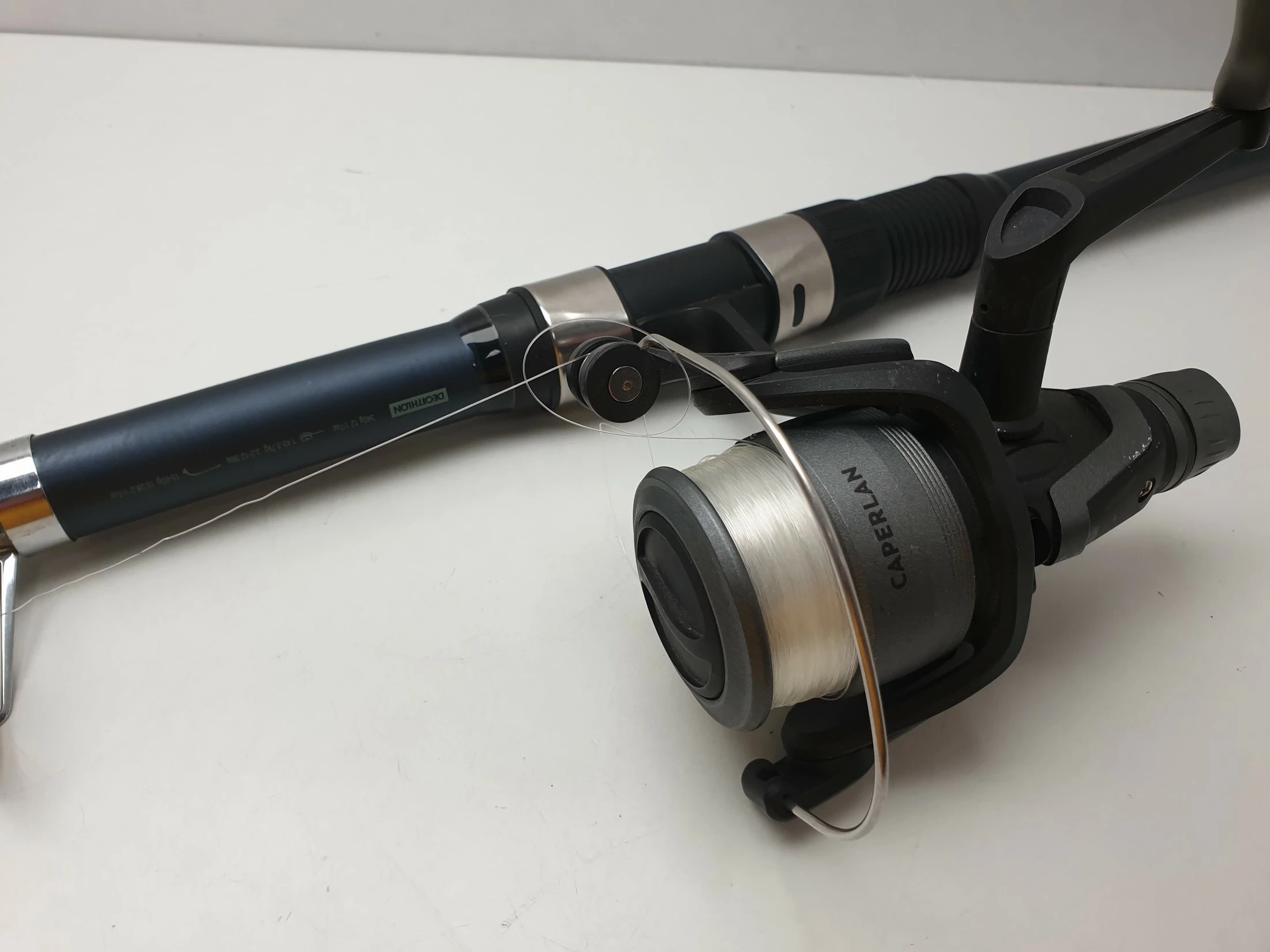 wedka-caperlan-ufish-z-kolowrotkiem-35-decathlon-ciezar-wyrzutu-1