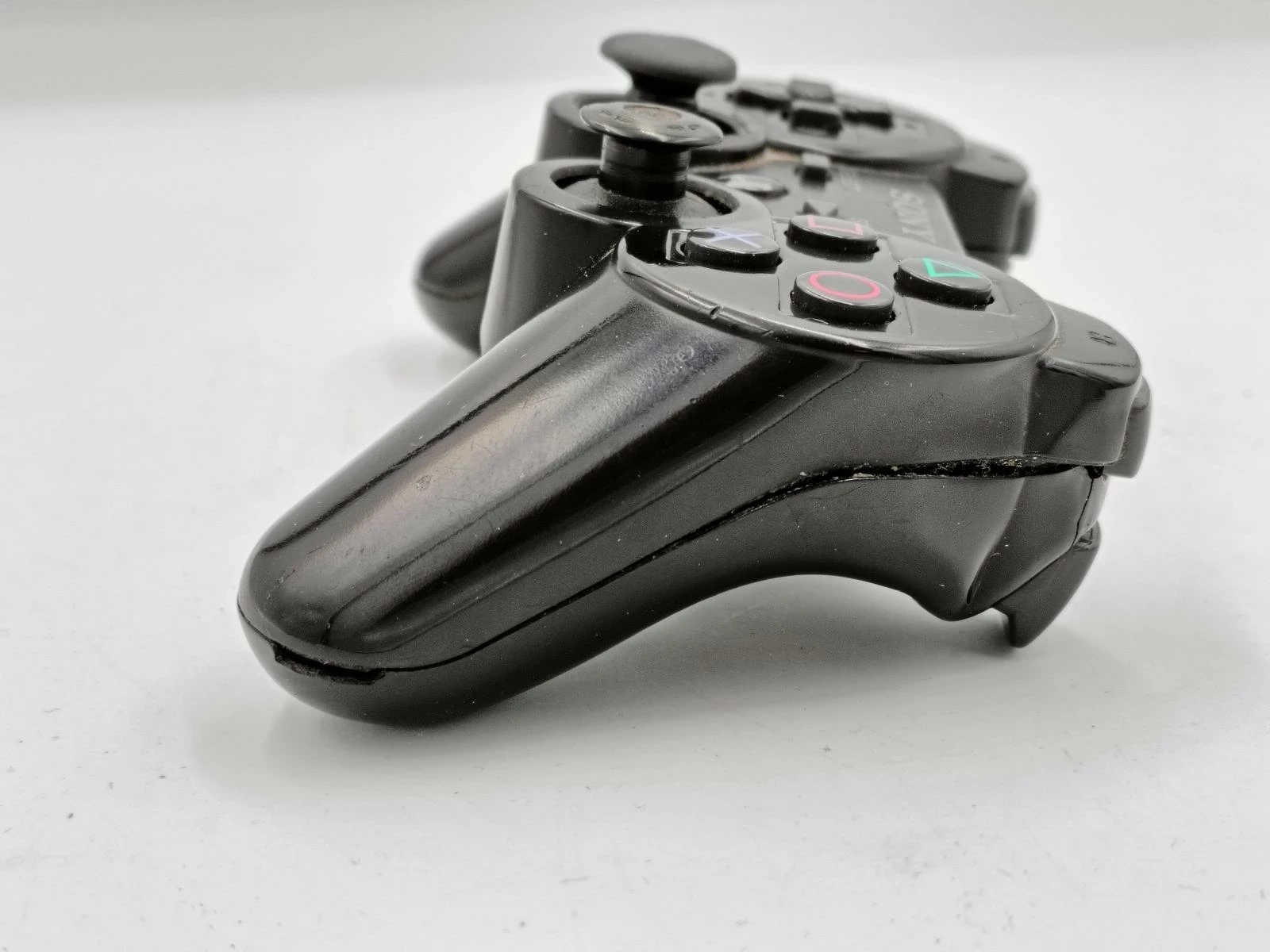 pad-sony-do-ps3-popekana-obudowa-brak-gumeczki-na-analogu-opis-kolor-czarny