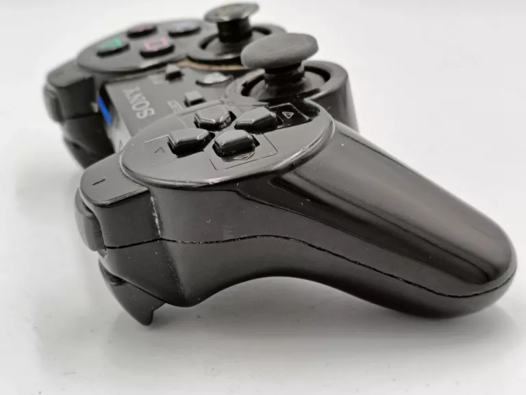 PAD SONY DO PS3 POPĘKANA OBUDOWA BRAK GUMECZKI NA ANALOGU OPIS