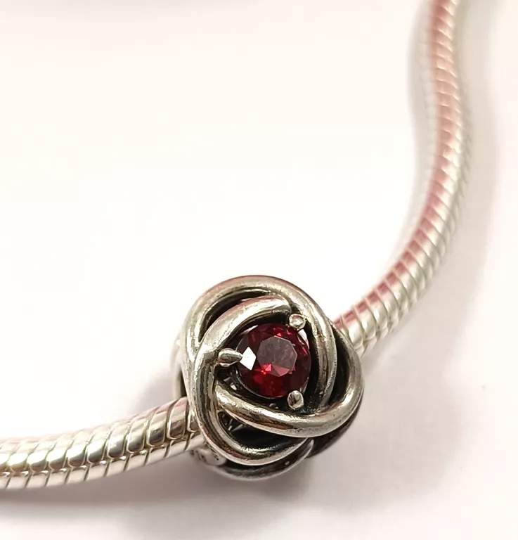 ZAWIESZKA CHARMS URODZINOWY SZKARŁATNY SYMBOL WIECZNOŚCI