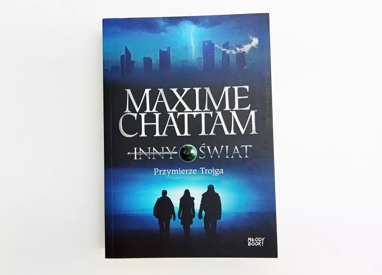 KSIĄŻKA PRZYMIERZE TROJGA. INNY ŚWIAT. TOM 1 MAXIME CHATTAM