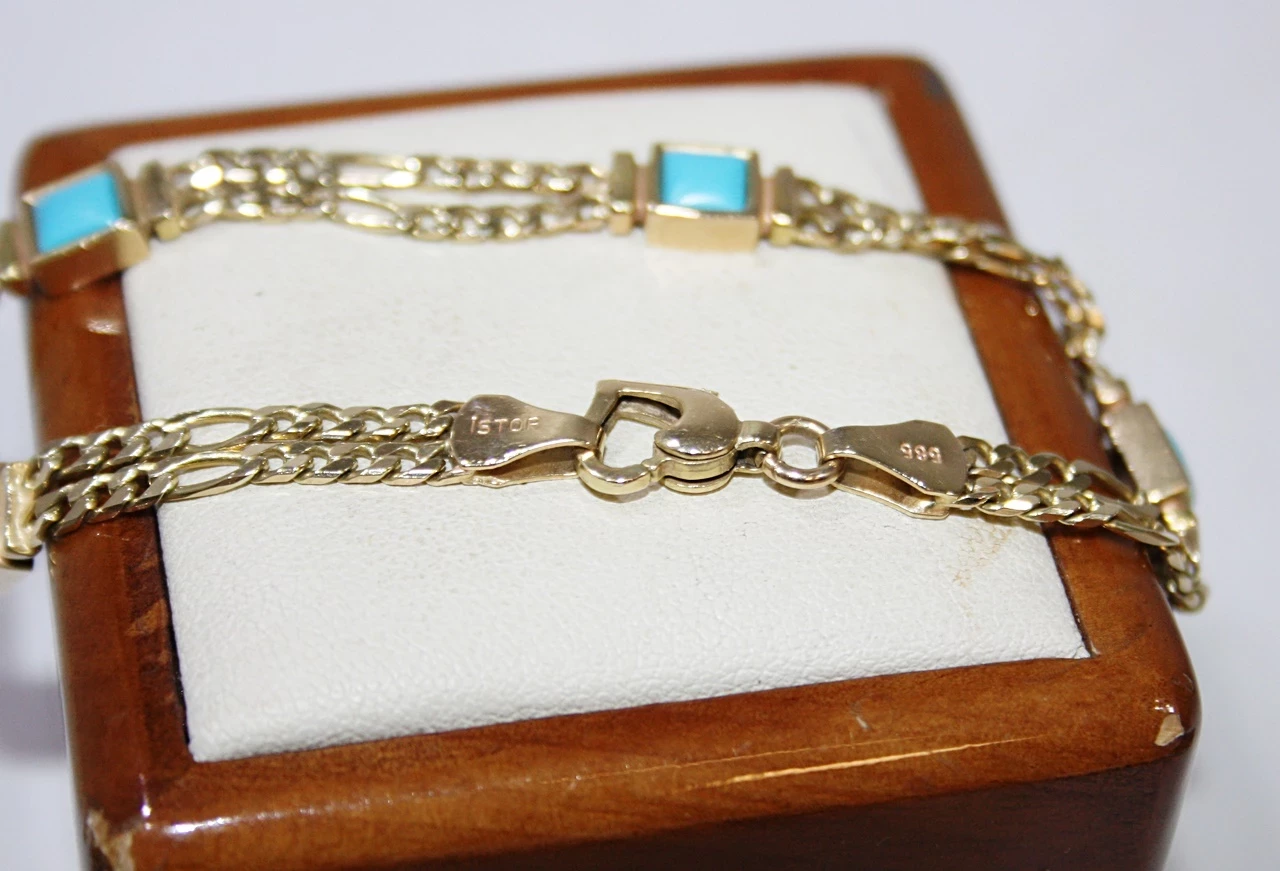 boska-zlota-bransoletka-z-niebieskimi-oczkami-1002g-r20-cm-material-zloto