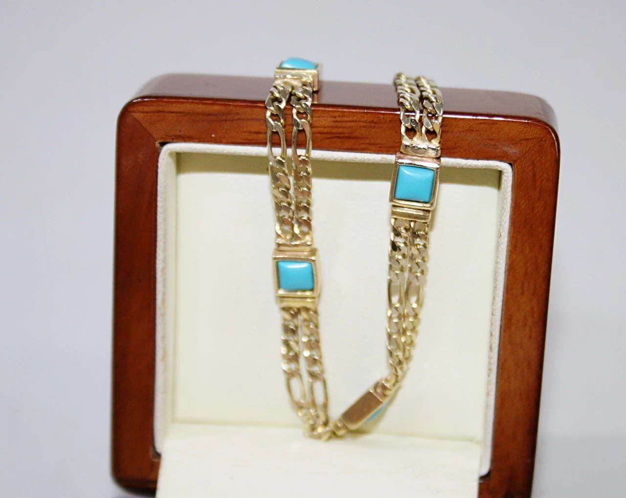 boska-zlota-bransoletka-z-niebieskimi-oczkami-1002g-r20-cm-stan-uzywany