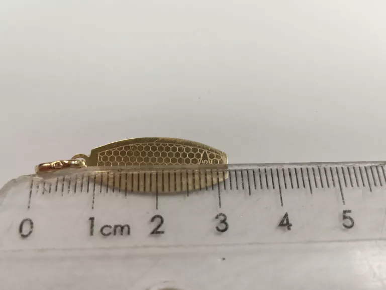 CIEKAWA ZŁOTA ZAWIESZKA/MEDALIK 1,05G  PR585