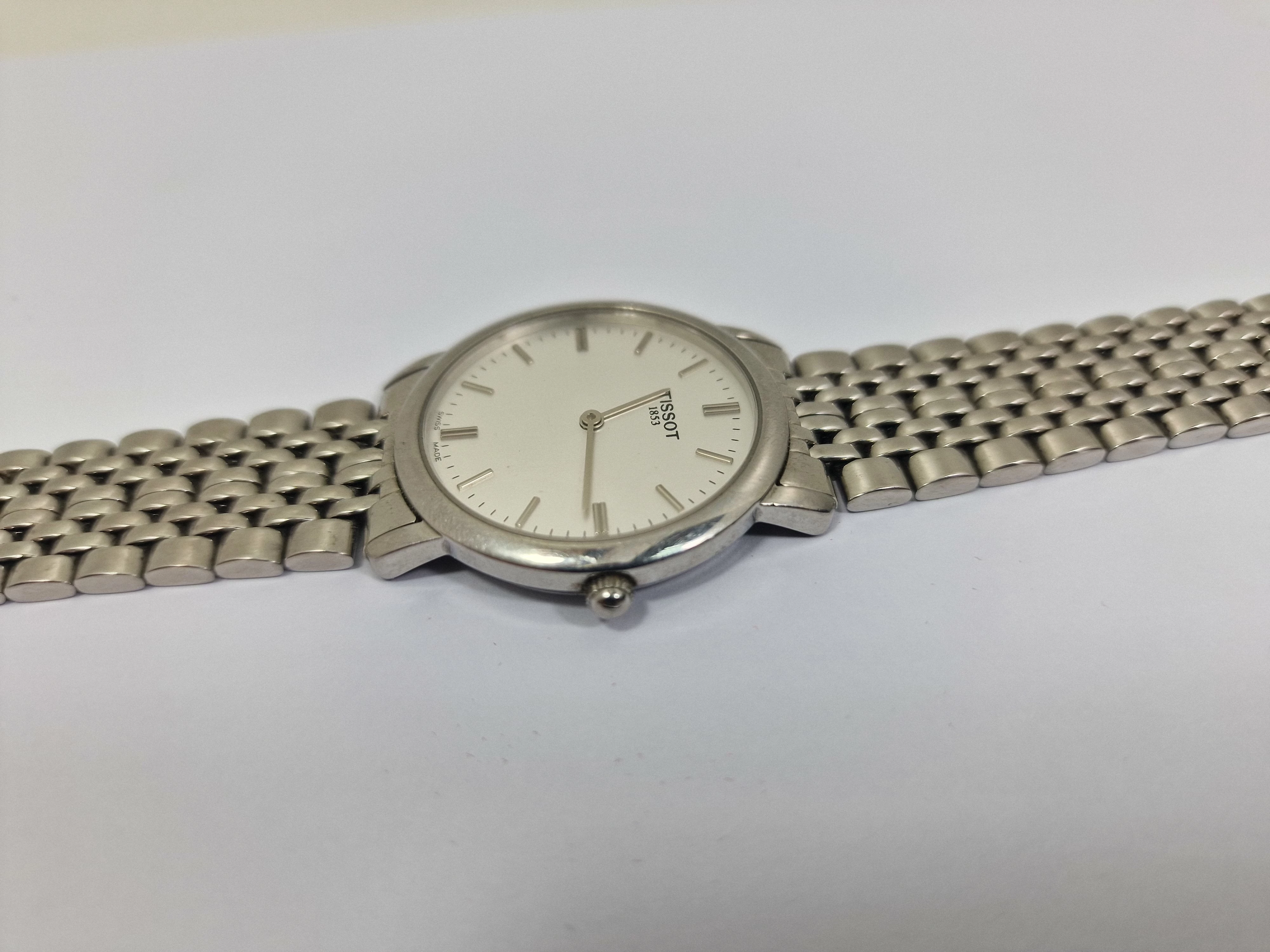 tissot-t109210a-uszkodzona-bransoleta-ksztalt-koperty-okragla