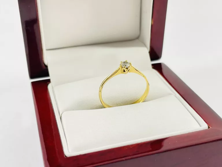 ZŁOTY PIERŚCIONEK Z BRYLANTEM 0,12CT 750 1,49G R12