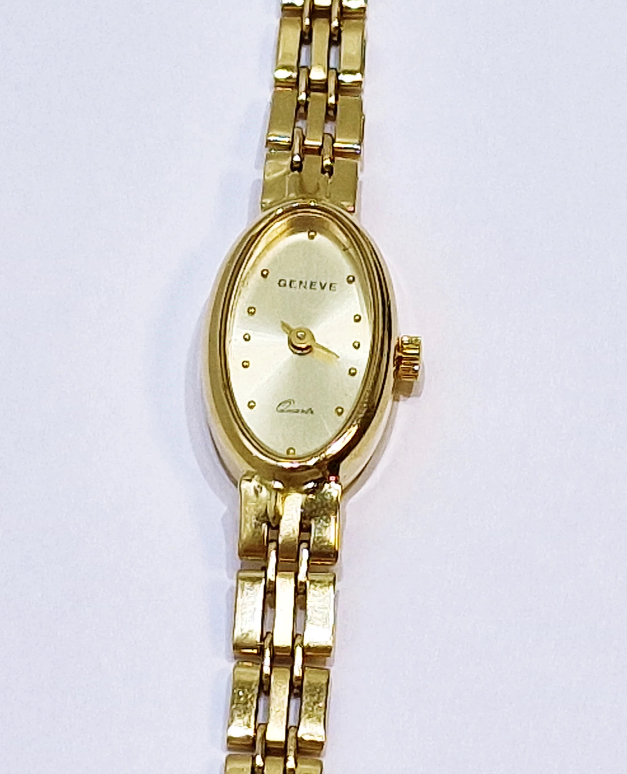 zegarek-damski-geneve-zloty-585-ksztalt-koperty-owalna