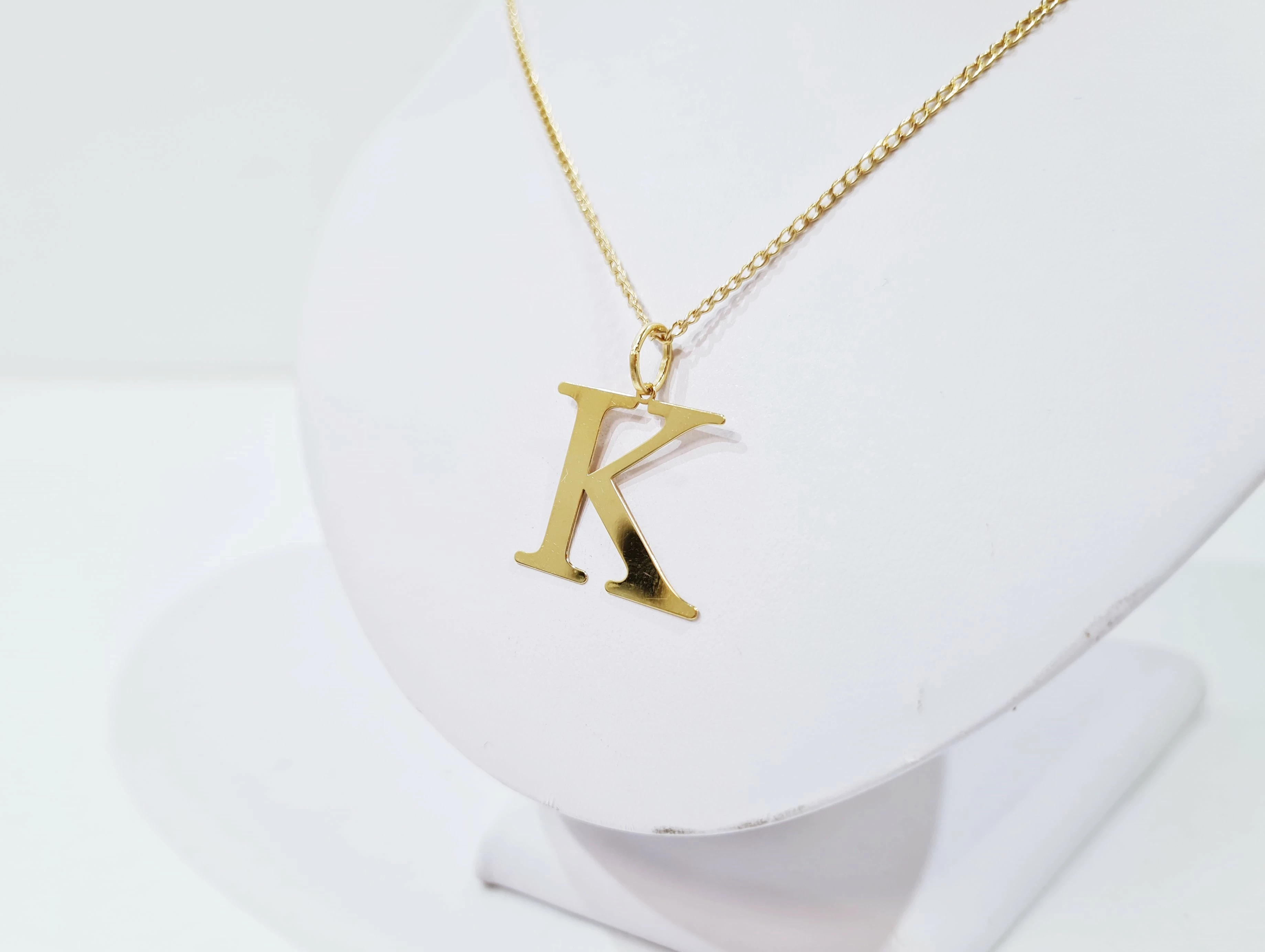 zlota-zawieszka-585-069-duza-litera-k-inicjal-kamien-bez-kamienia