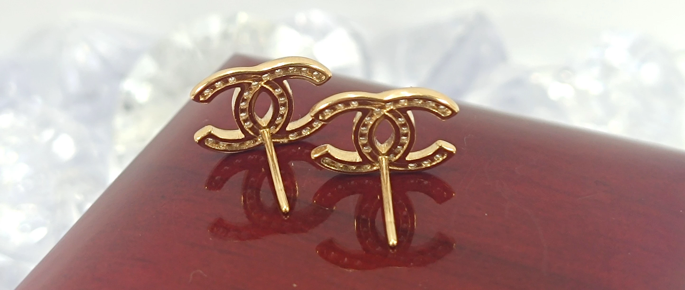 nienoszone-zlote-kolczyki-chanel-z-cyrkoniami-585-184g-material-zloto