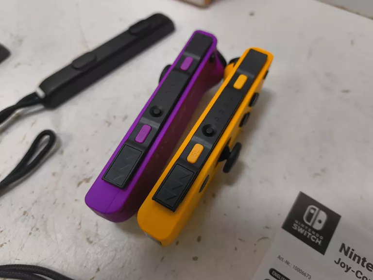 KONTOLER NINTENDO SWITCH JOY CON ZESTAW 2 SZT FIOLETOWY I ŻÓŁTY