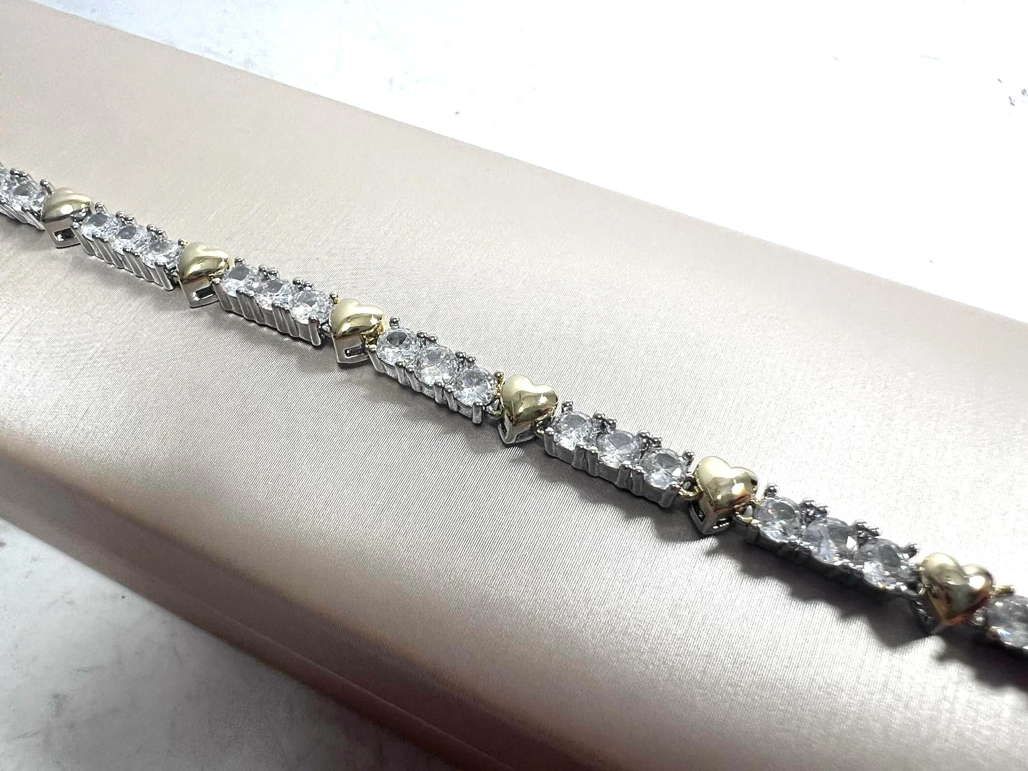 bransoletka-stal-chirurgiczna-zloto-srebrna-segmenty-serca-marka-226434-1704211