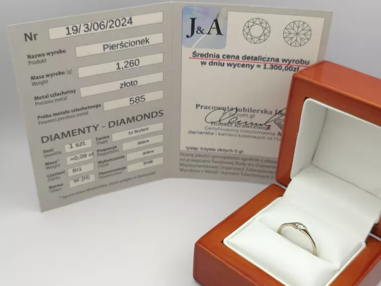 PIERŚCIONEK Z BIAŁEGO ZŁOTA Z DIAMENTEM 0,09 CT - 585 14K R.11 1,26G