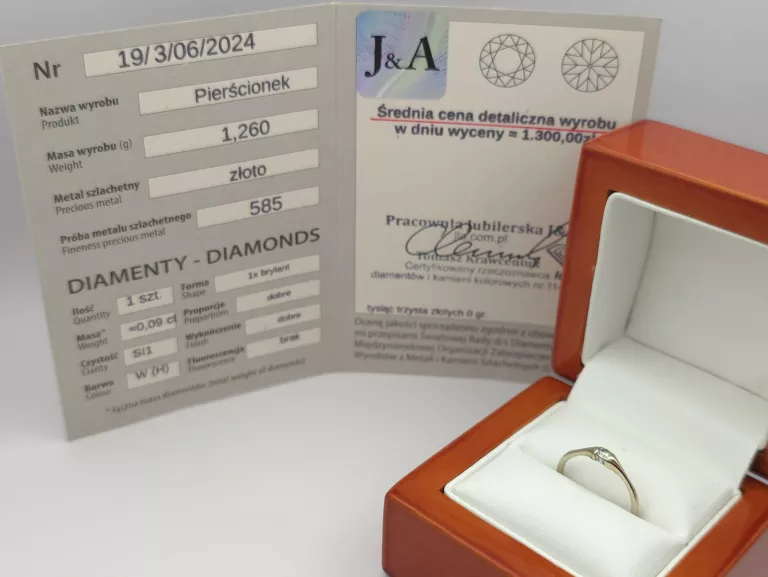 PIERŚCIONEK Z BIAŁEGO ZŁOTA Z DIAMENTEM 0,09 CT - 585 14K R.11 1,26G